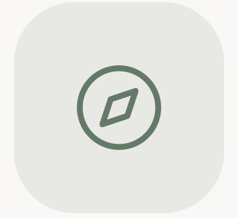 Icono de un diamante en un círculo en fondo gris claro