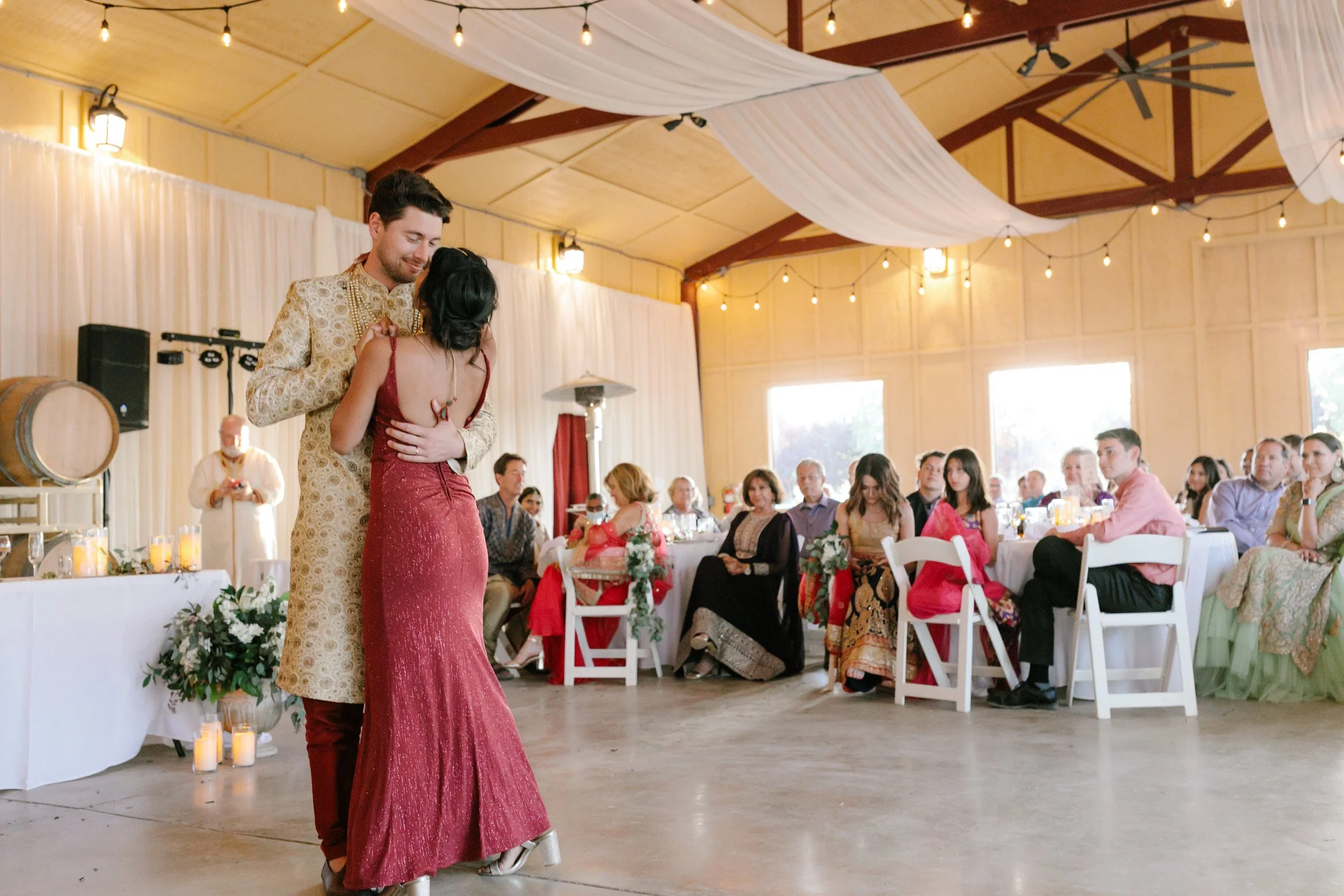 Bride and groom dancing at Four Sisters Ranch winery wedding venue in Paso Robles, California