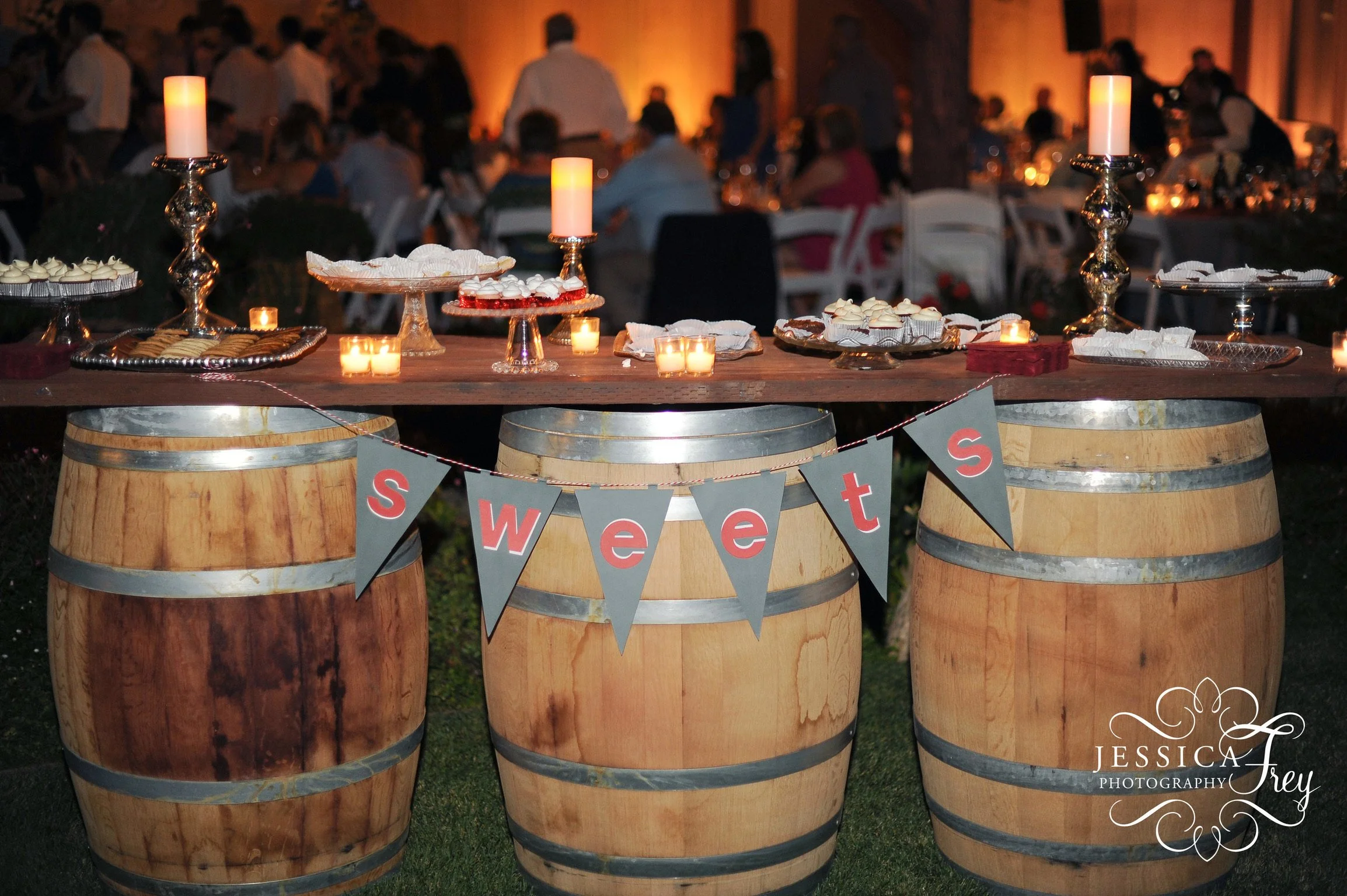 Wine barrel decor wedding reception at Four Sisters Ranch Vineyards & Winery
