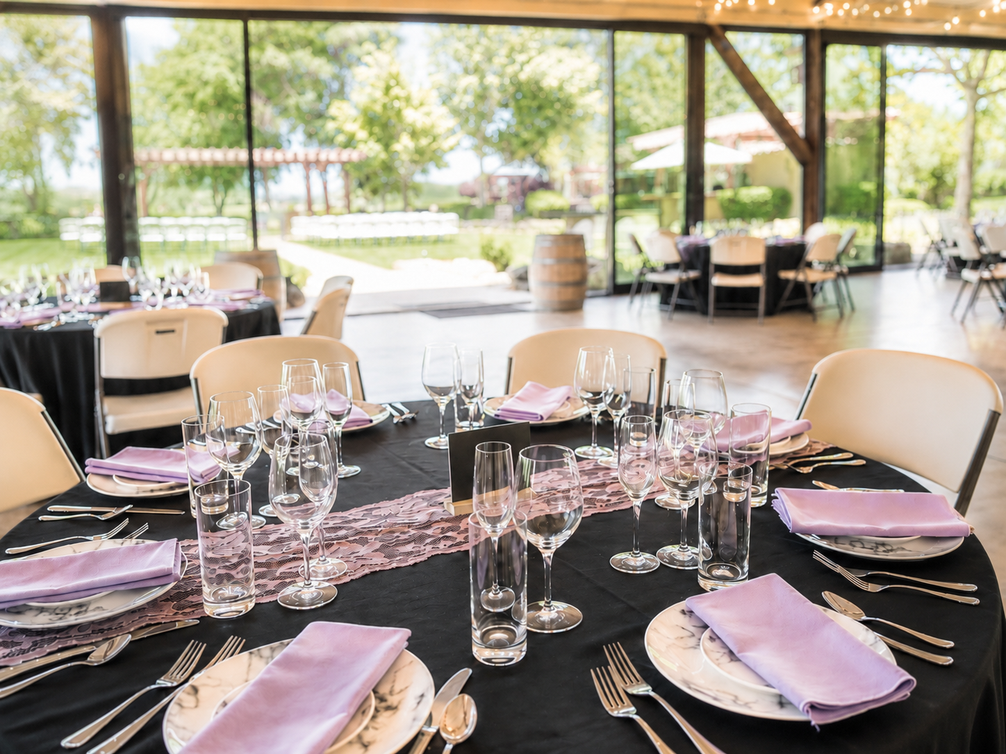Indoor barn house banquet setup at Four Sisters Ranch wedding and event venue in Central Coast, California.