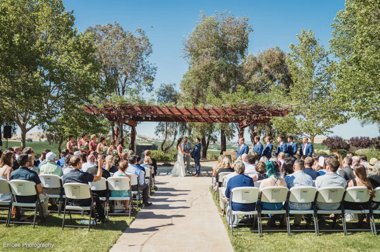 Outdoor wedding ceremony at Four Sisters Ranch Winery in Paso Robles - Emcee Photography