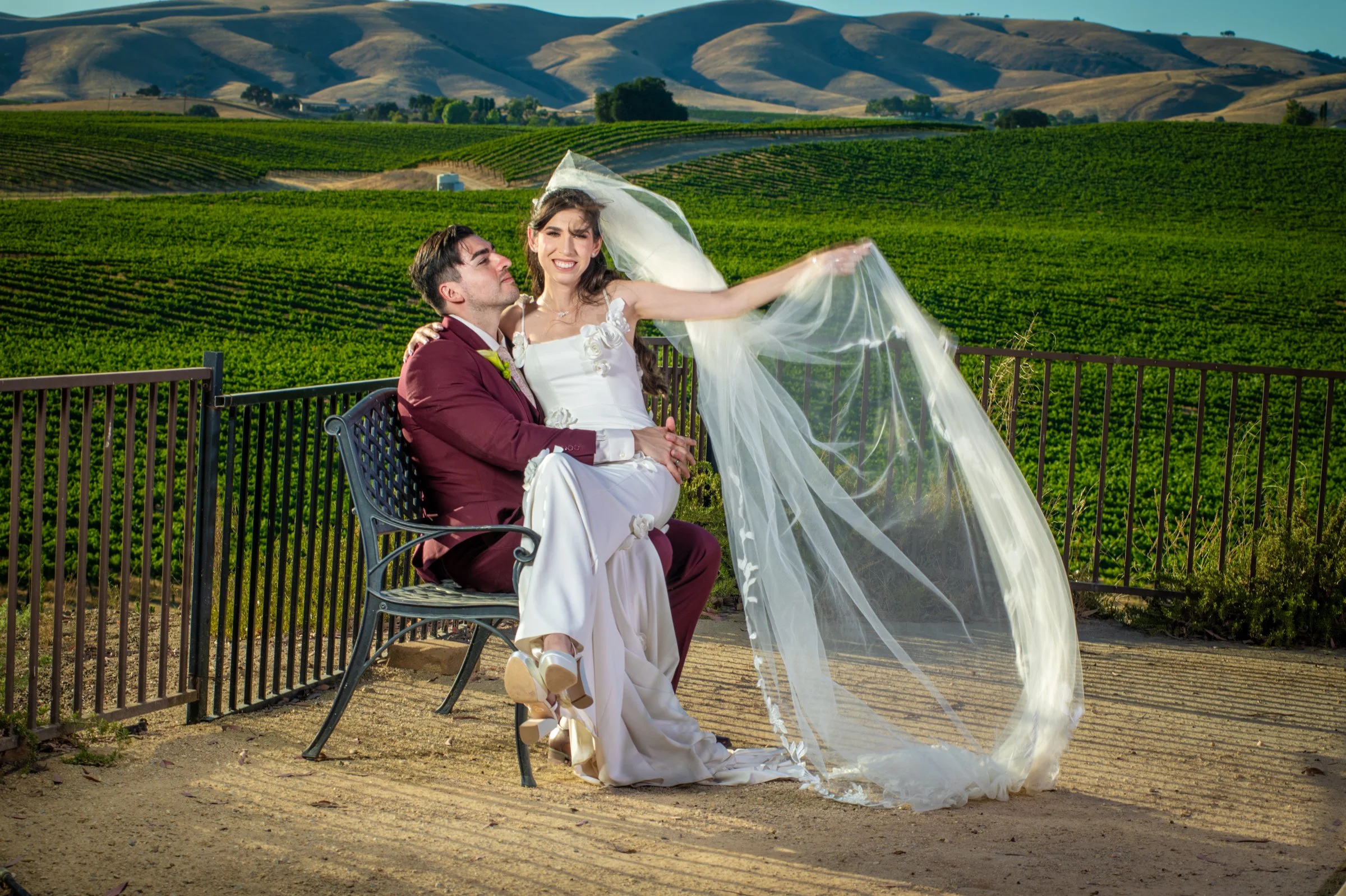 Bride and groom and view from Four Sisters Ranch Vineyards & Winery