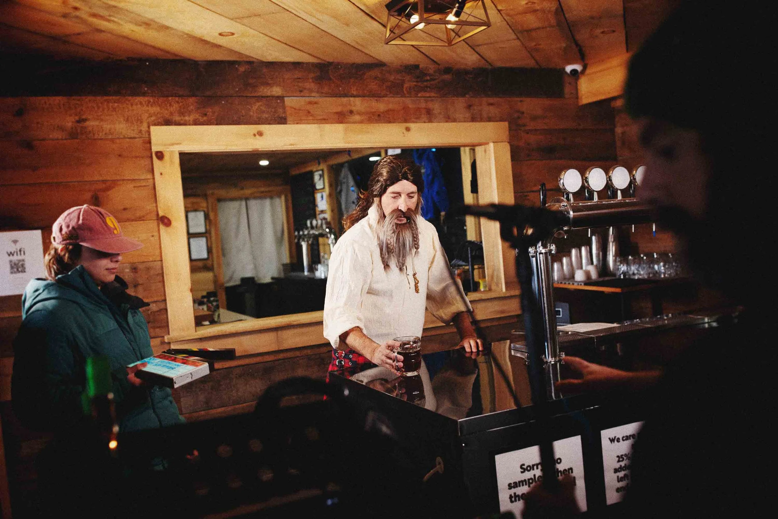 Behind-the-scenes photo of our local Scotsman tending drinks and deep biblical thoughts at the Alpine Goat Brewery. 