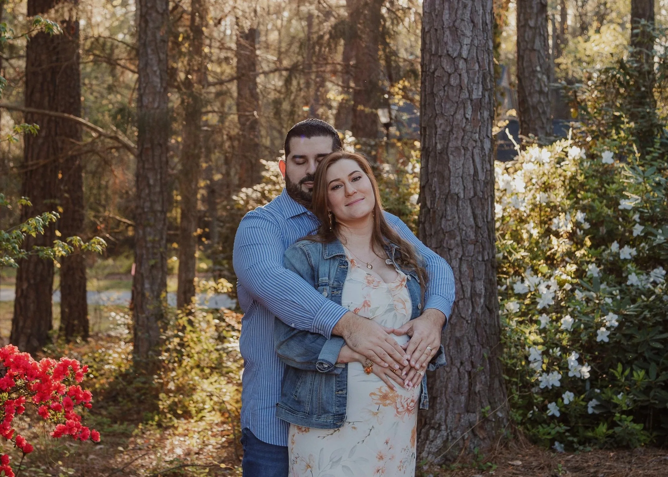 Husband and wife celebrate pregnancy with maternity photos at home in Raleigh, NC.