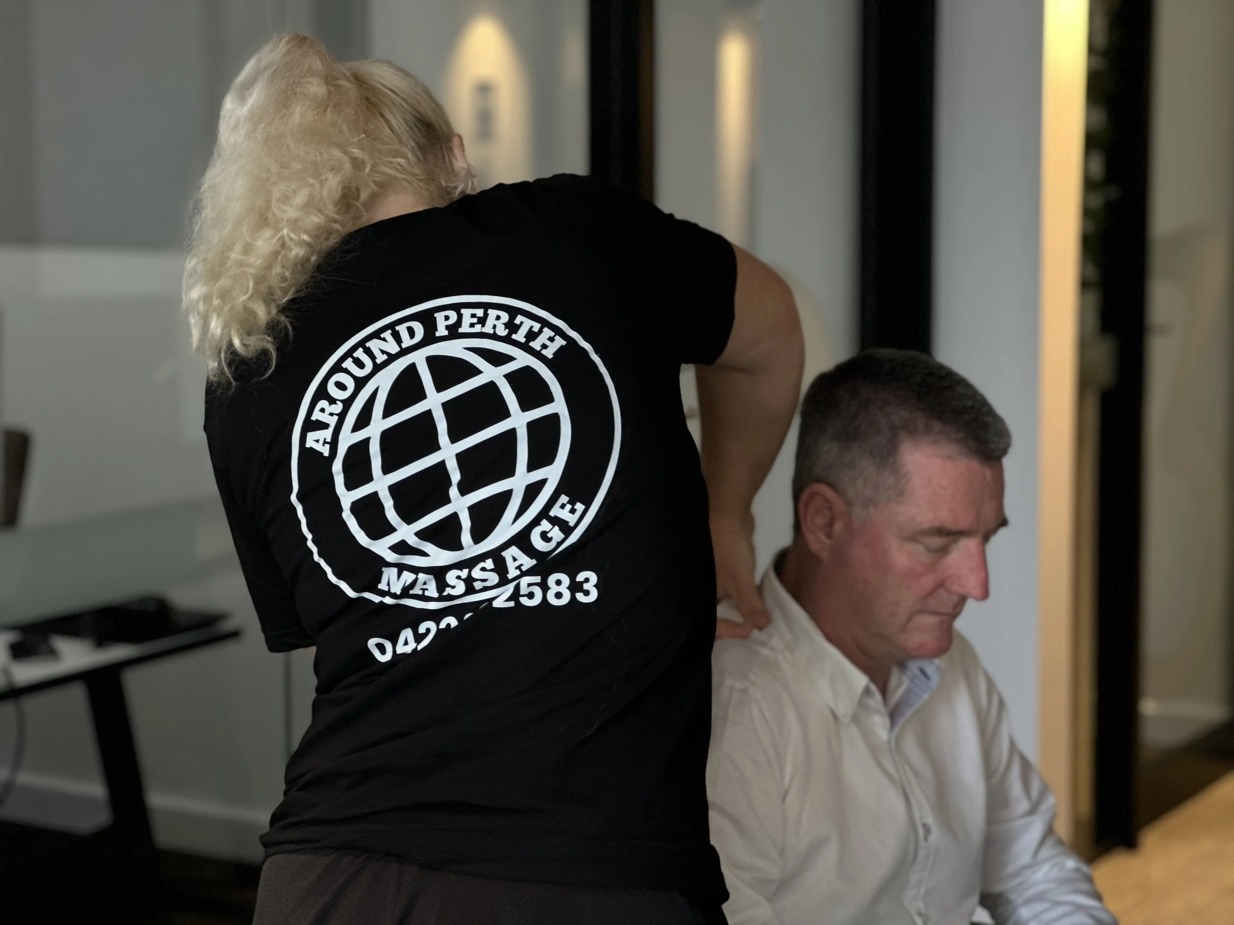 Seated chair massage in Perth for office and corporate settings