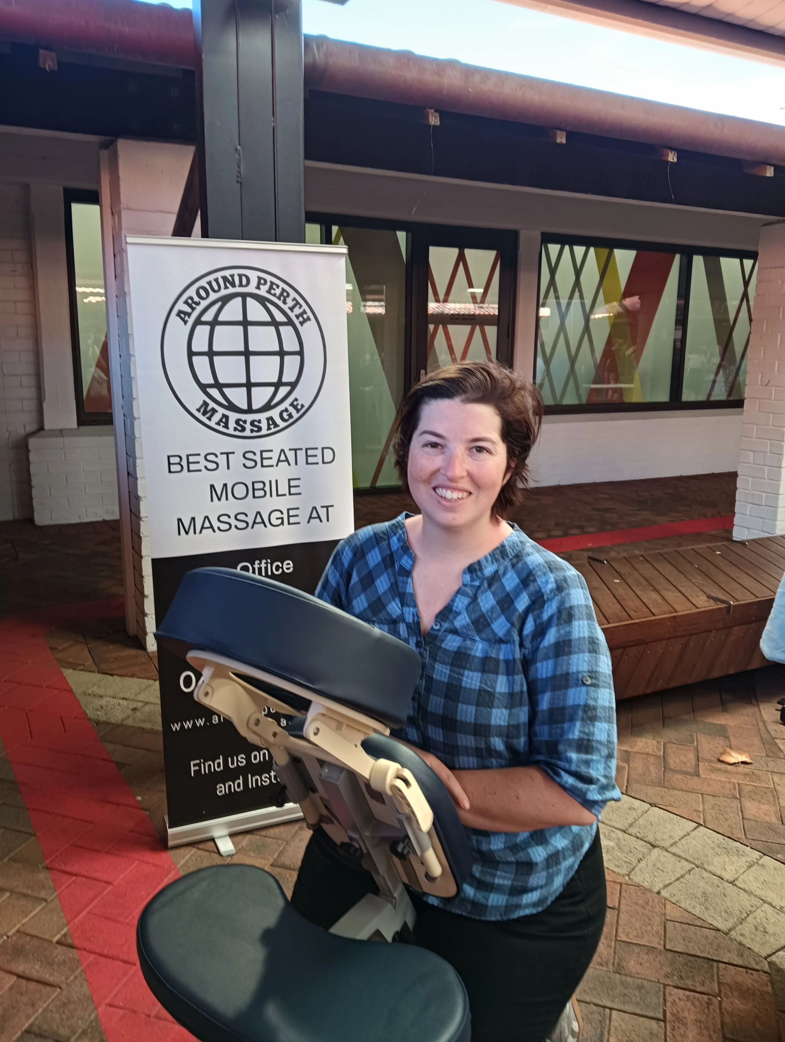 Happy customer enjoying a massage from Around Perth Massage.