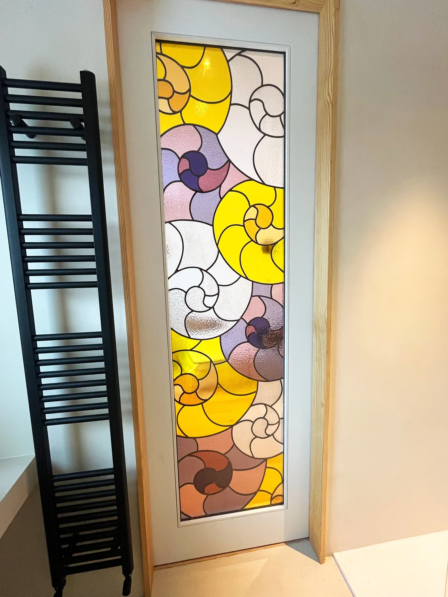 eirlume-studio-stained-glass-door-ensuite.jpg