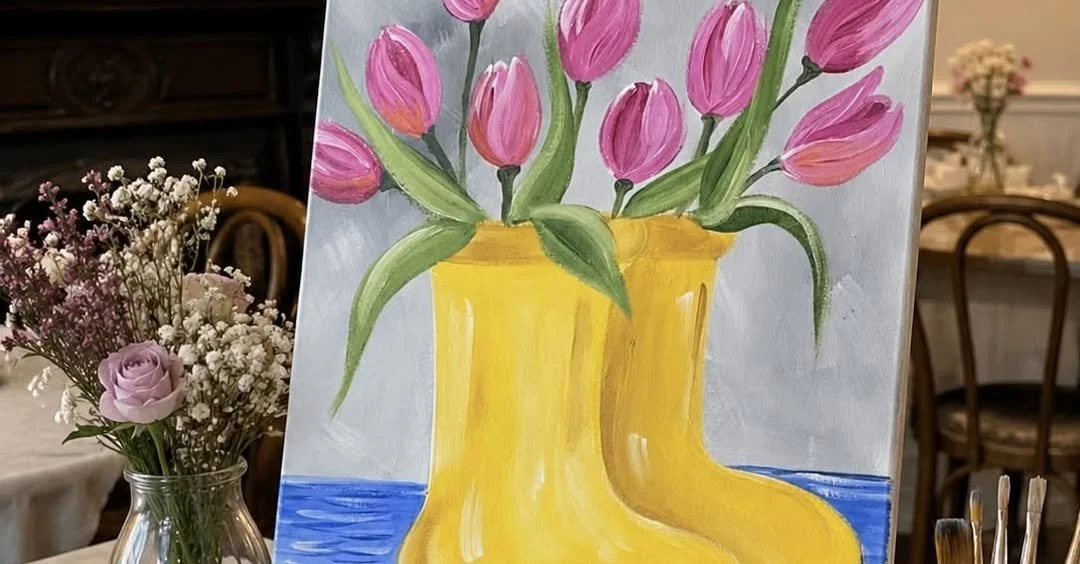 Painting canvas showing pink tulips in a yellow welly boot during a creative canvas painting workshop at The Artea Room. Guests can enjoy a fully guided art session with tea, coffee and homemade mini cakes included.