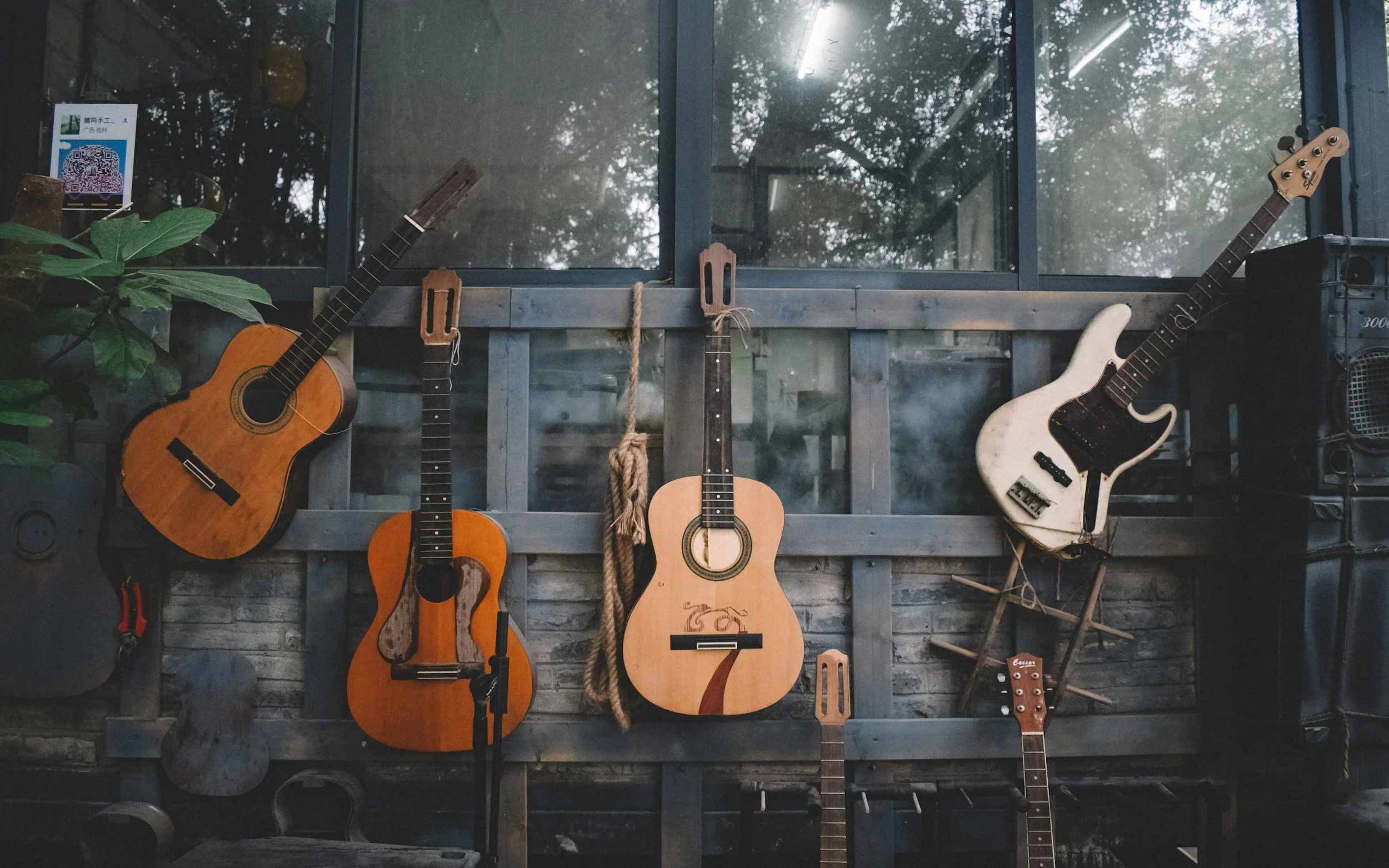 Four different Guitars hanging