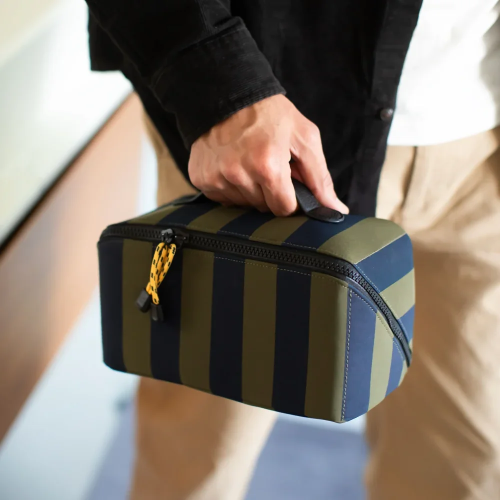 gardern_green_blue_flat_lay_wash_bag_lifestyle_2.webp