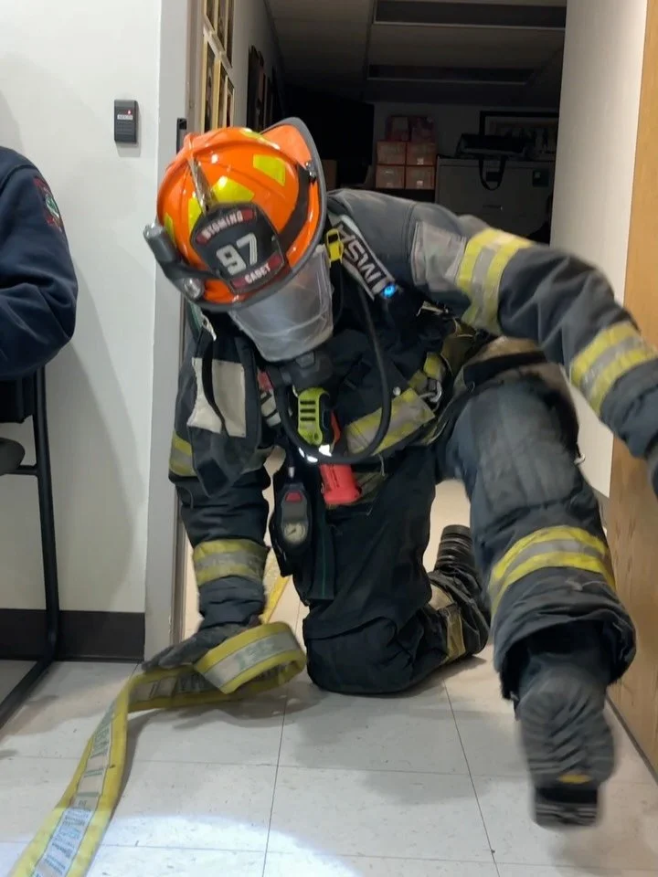 Our cadets did some great work last night practicing downed firefighter search and rescue. Using masks with limited visibility, they followed the hose to find their fellow firefighter, transfilled his bottle from the RAT bag, and worked together to d