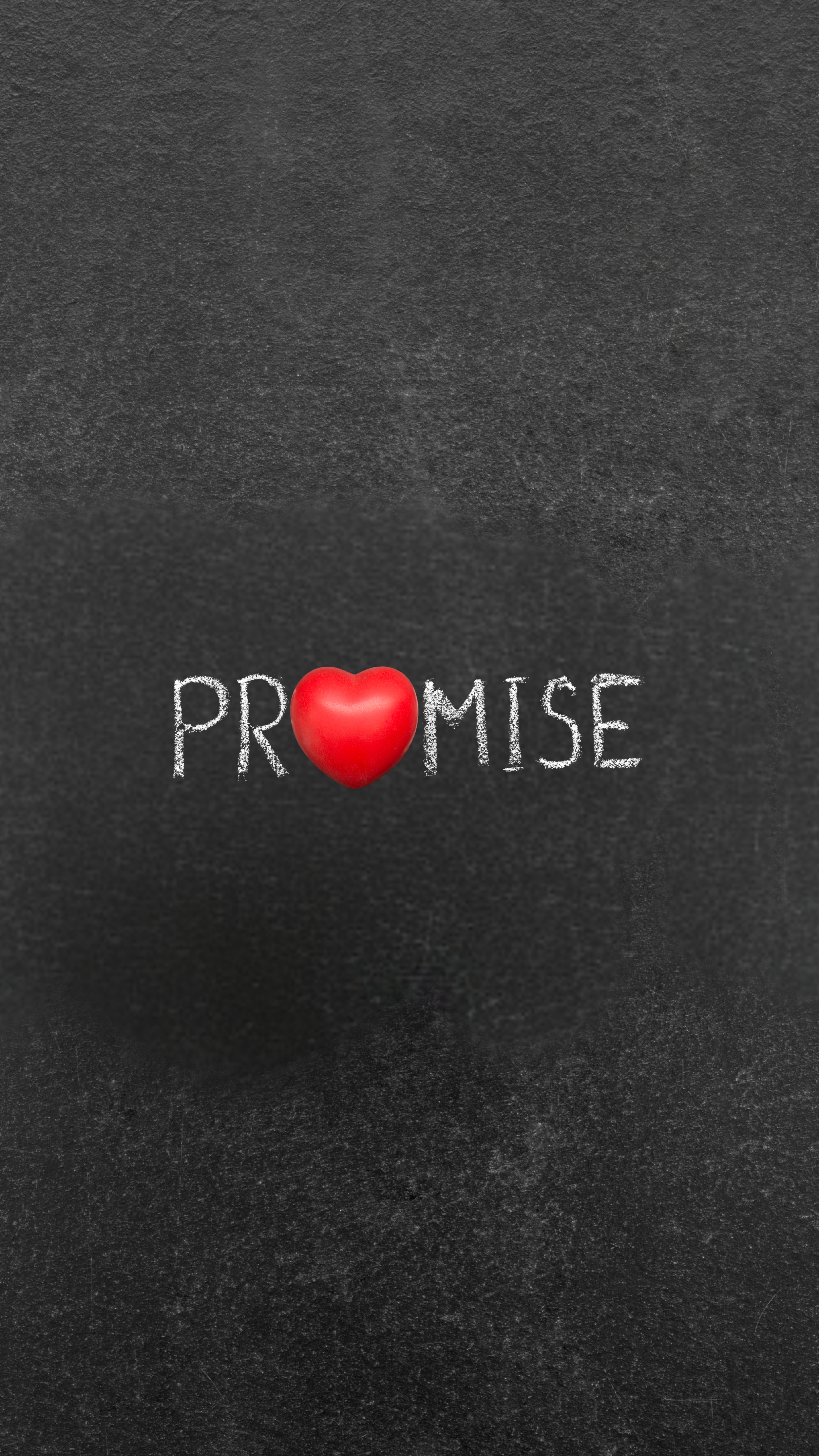 Das Wort 'PROMISE' ist auf einer schwarzen Tafel geschrieben, wobei das 'O' durch ein rotes, herzförmiges Symbol ersetzt wurde.