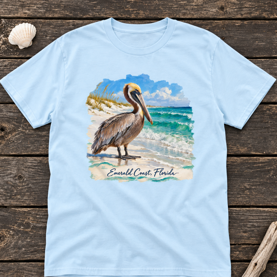 Emerald+Coast+pelican+tee+flat+lay.png