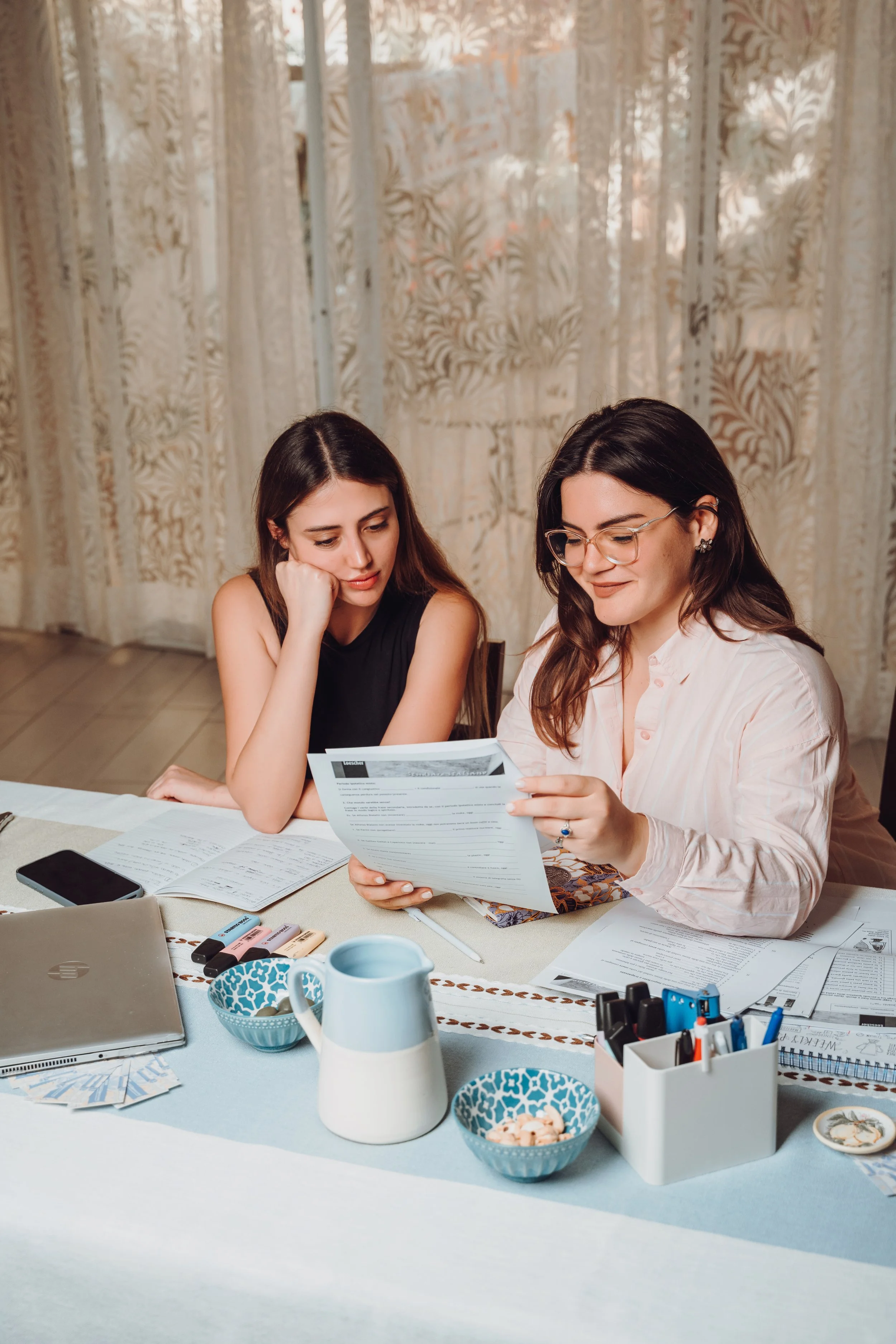 two girls speaking italian