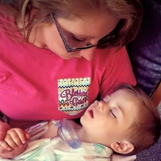 tanner with nebulizer.jpg