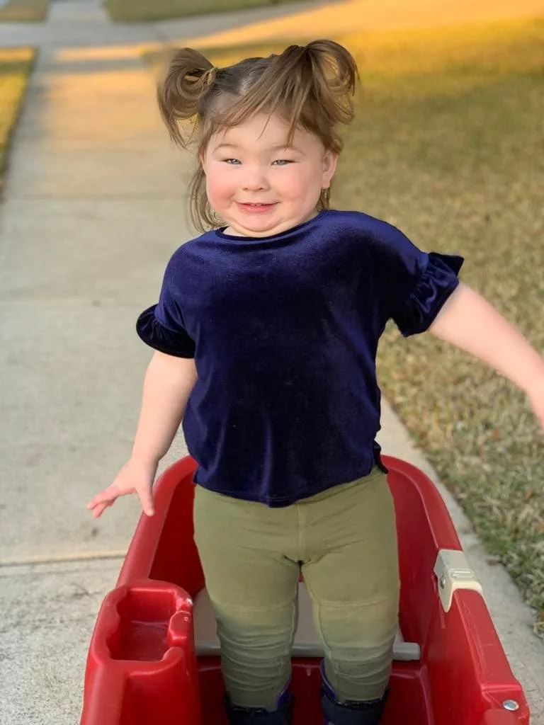 violet standing in wagon.jpg