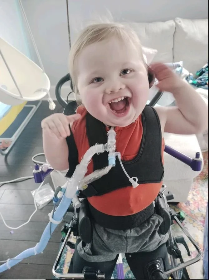 boston in stander smiling.JPG