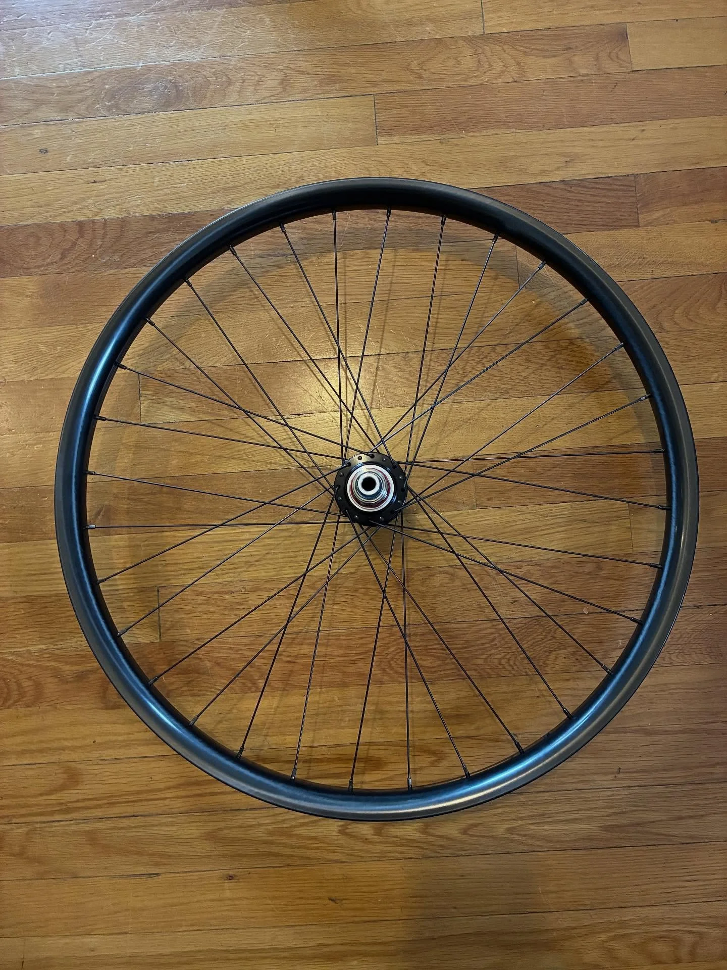 This rear wheel is headed to the central Oregon single track next week. We Are One Carbon rim laced to White Industries XMR hub. #vernbuiltwheels #handbuiltwheelsarebetter #handbuiltwheels #weareoneunion #weareonecomposites #whiteindustries #whiteind