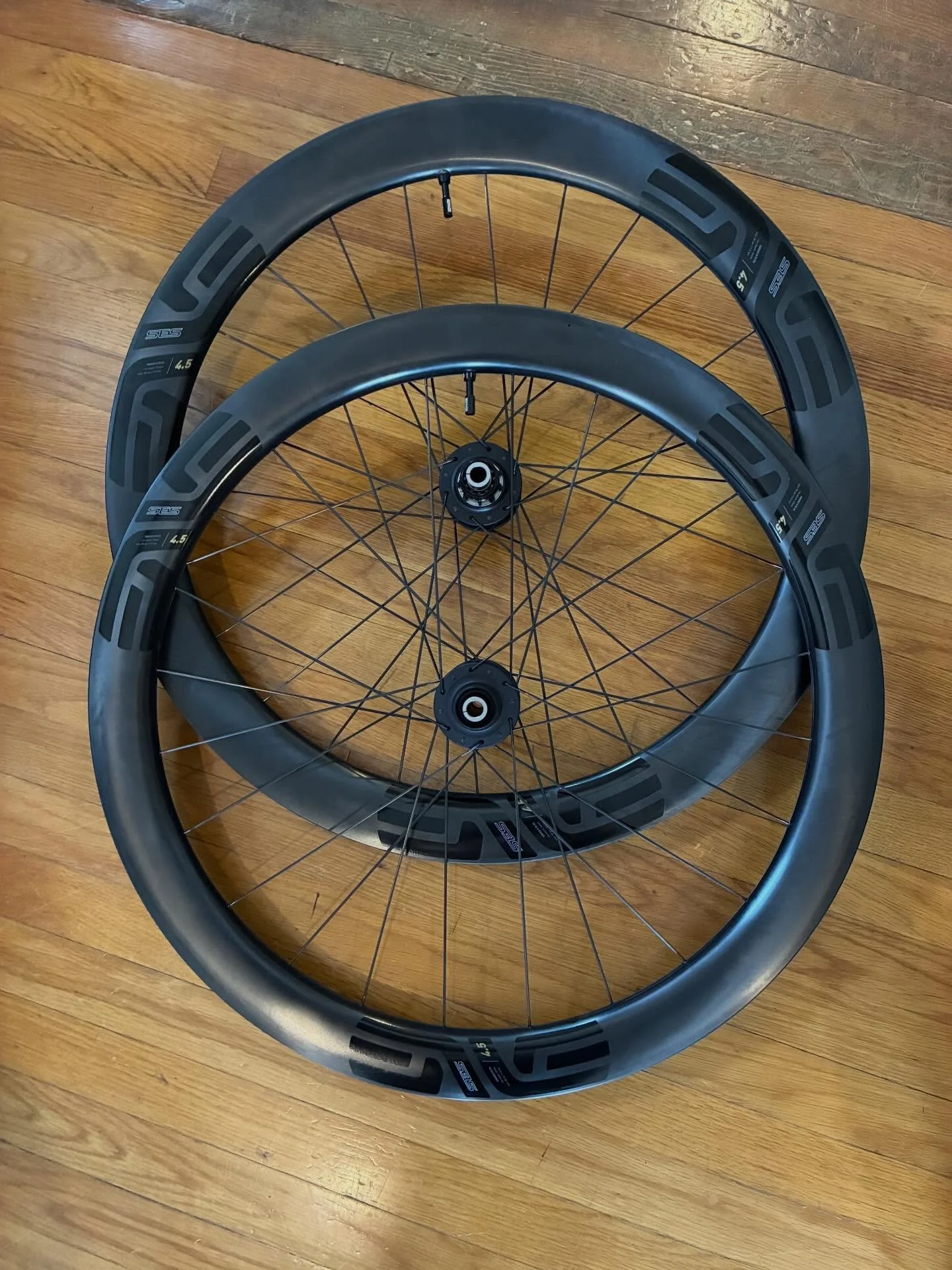 These are ready for Santa Claus to pick up for one lucky cyclist in Colorado. Enve Carbon rims laced to Chris King hubs. 1540 grams. #vernbuiltwheels #handbuiltwheelsarebetter #chriskingbuzz #envecomposites #chriskinghubs #visitjacksonvilleoregon #ja