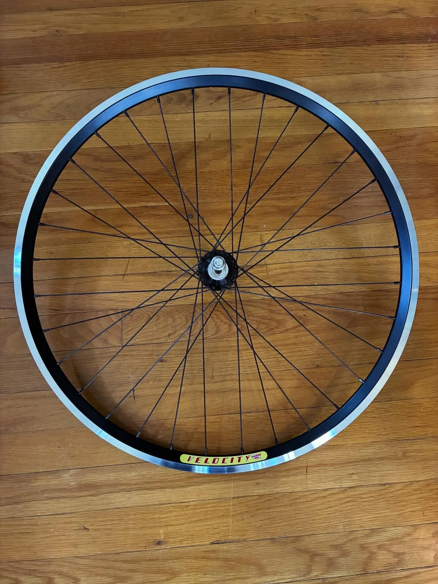 This old school single speed/rim brake rear wheel is headed to San Diego next week. White Industries ENO hub laced to a Velocity Dyad 26 in rim. It will be set up as a single speed freewheel on one side and fixed gear on the other. #vernbuiltwheels #