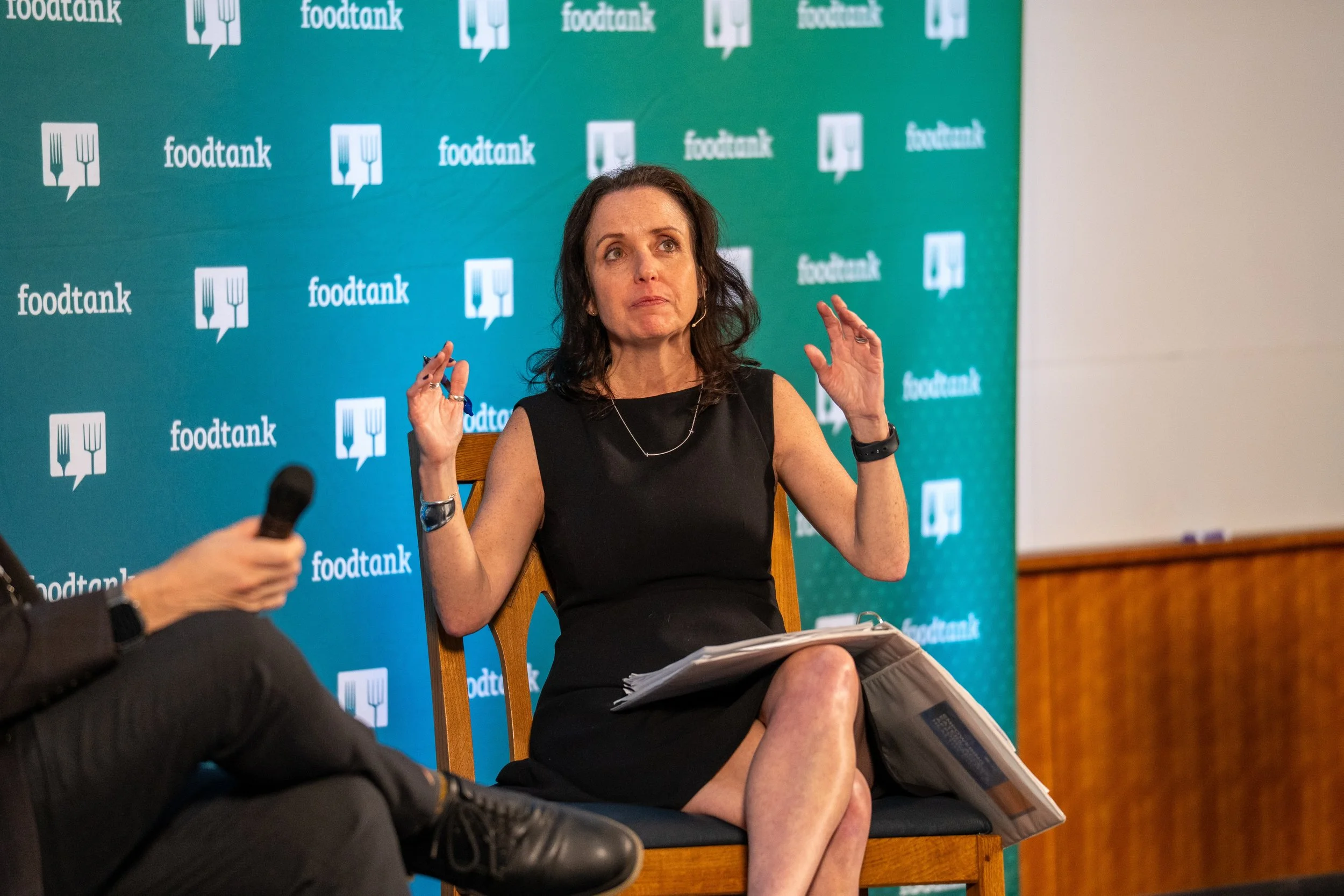 Presenter speaking at an individual interview at a Durham conference