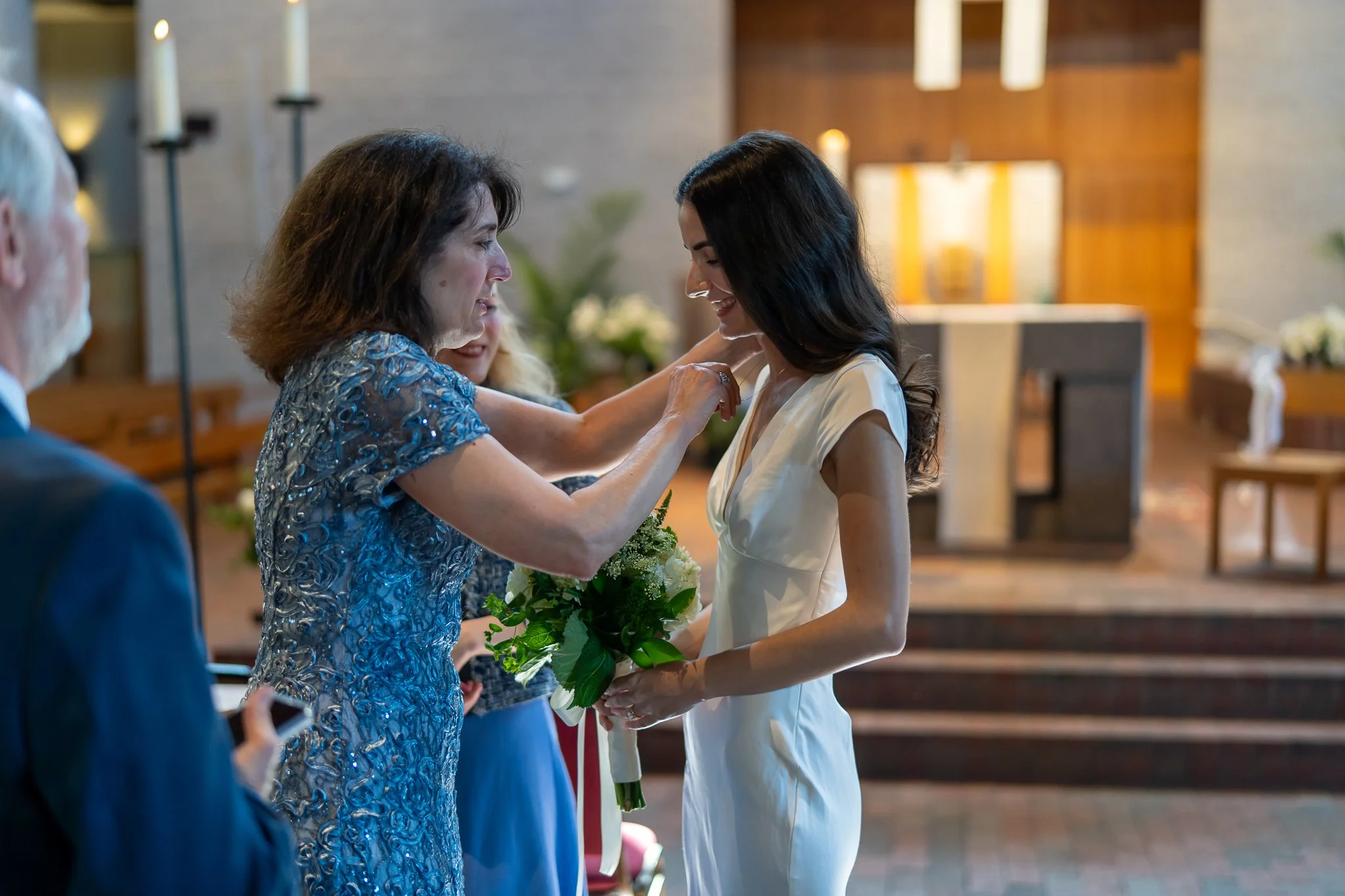 Mother helps bride during Raleigh, NC wedding