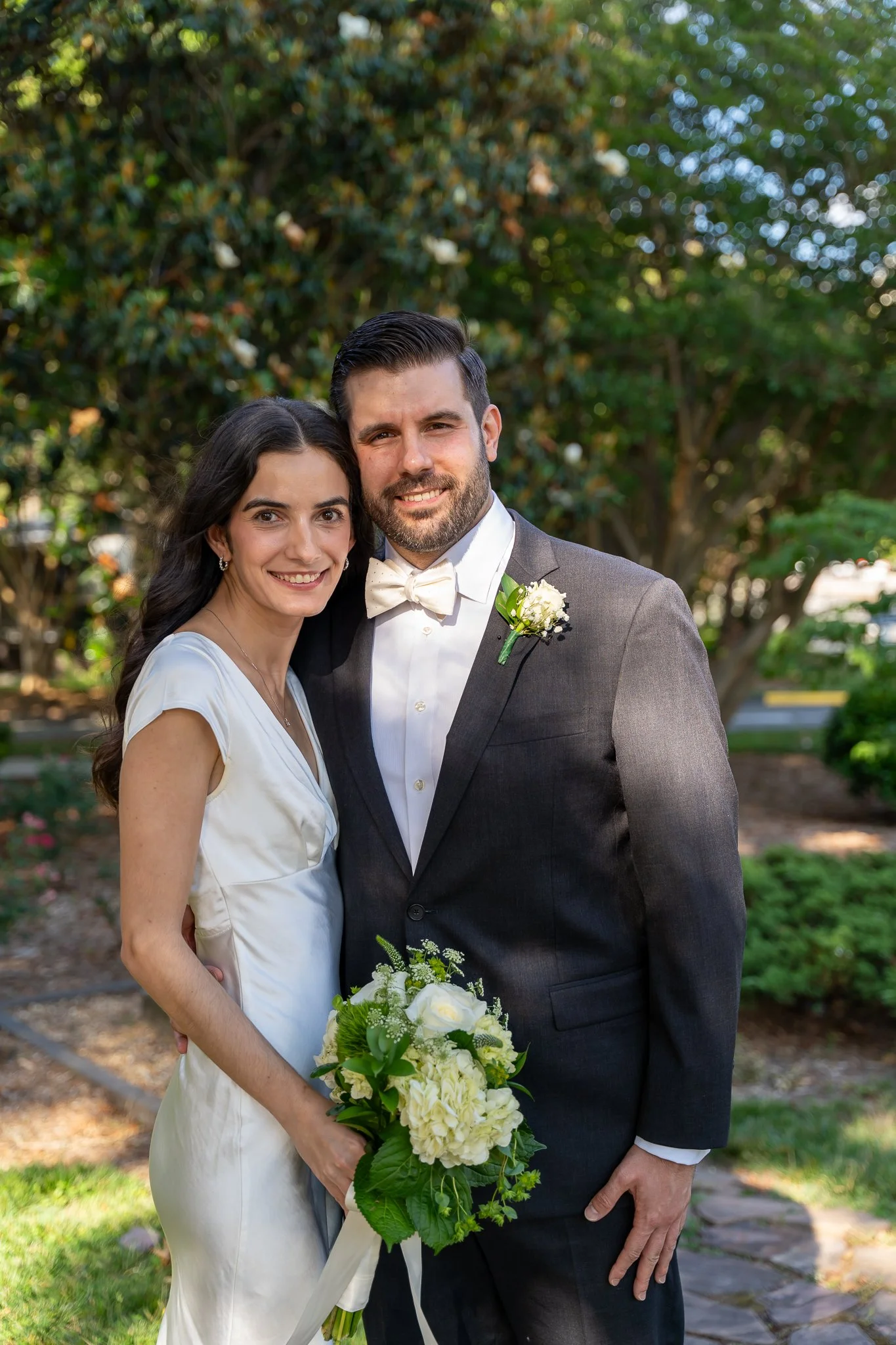 Bride and groom pose at Raleigh, NC wedding
