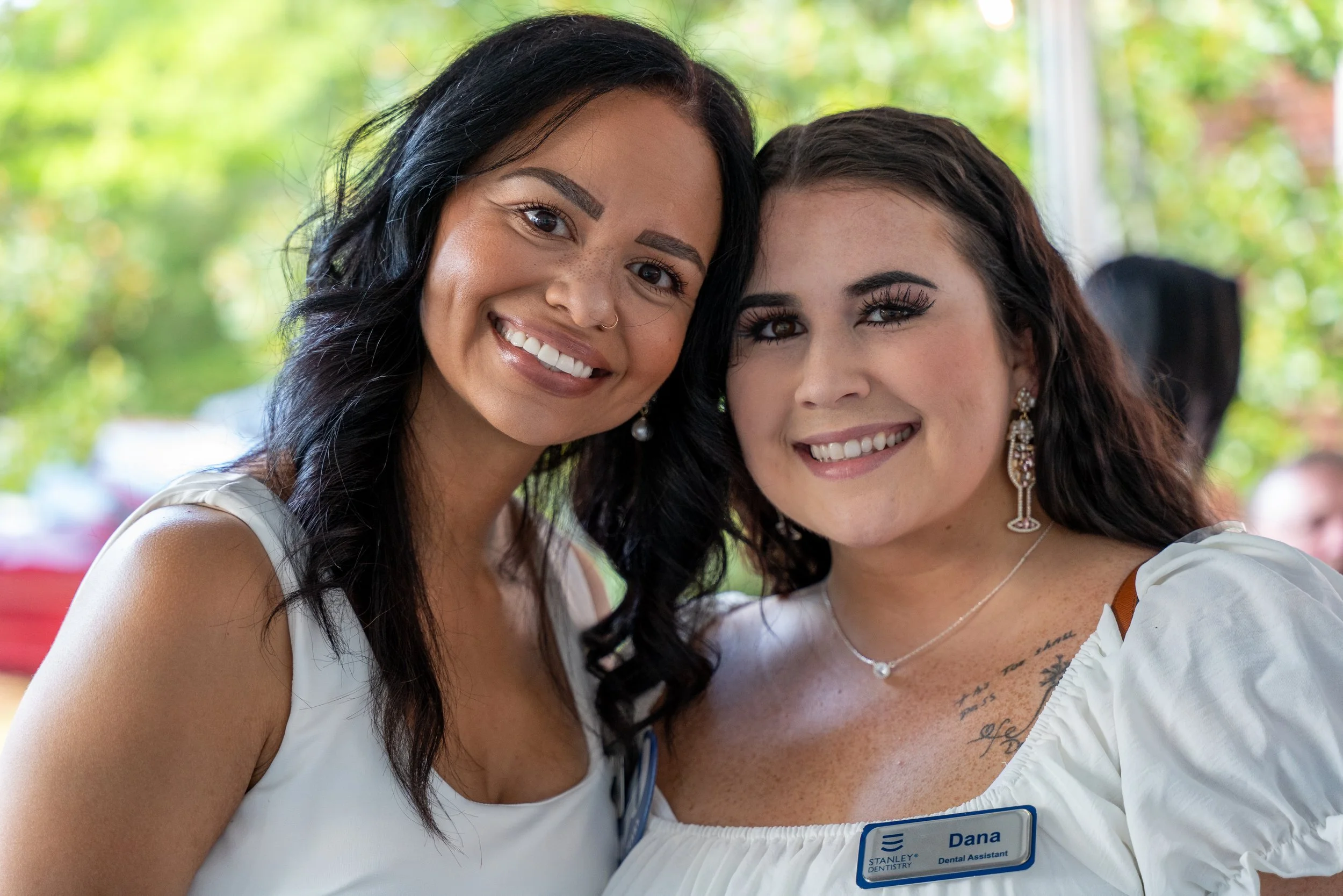 Guests posing at a corporate anniversary event