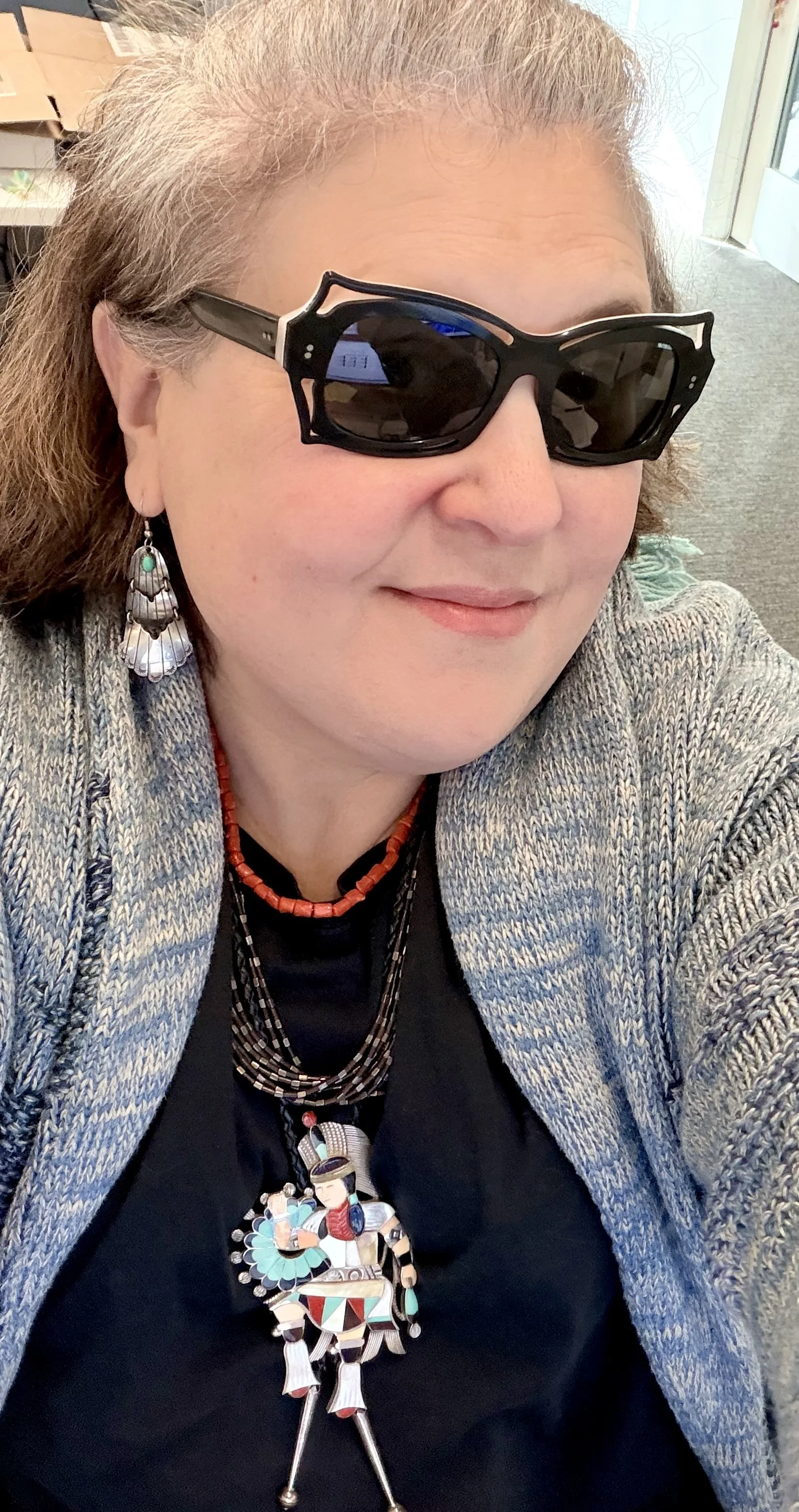 Wearing Ed Aguilar, Eddie Beyuka, and vintage coral and earrings