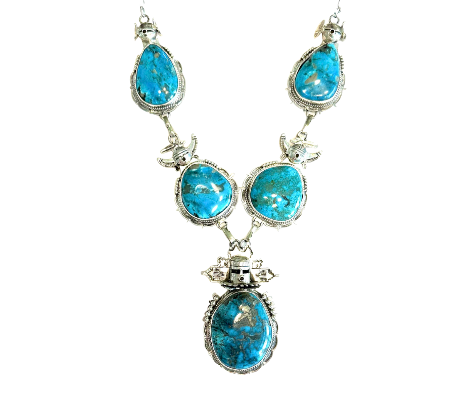 Necklace with silver setting and blue turquoise stones.