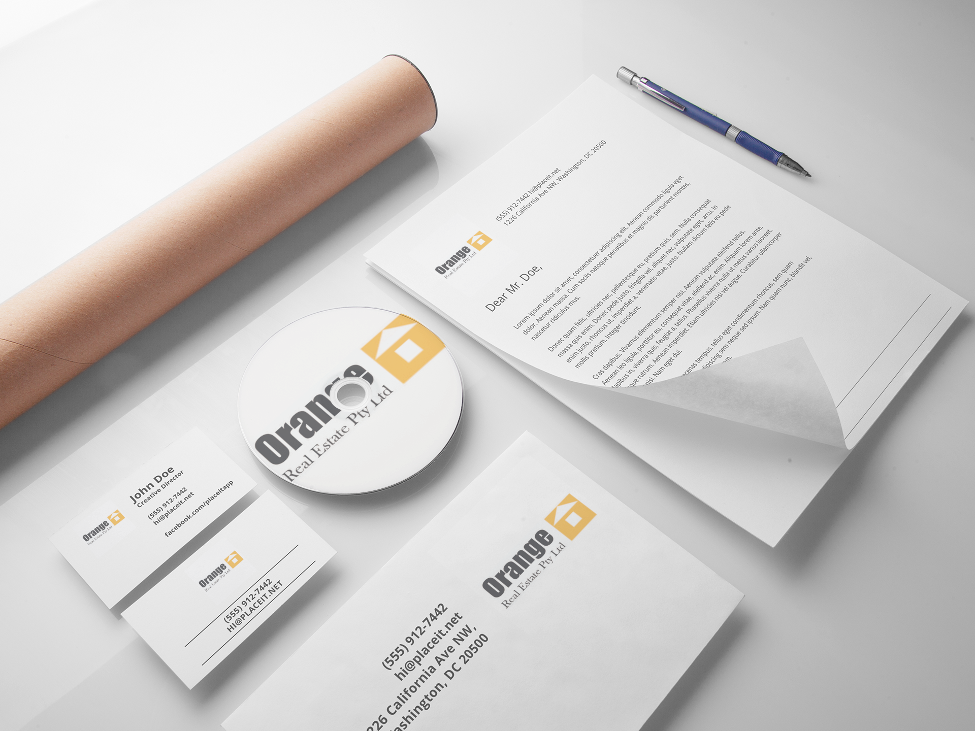 Business stationery and promotional materials for Orange Real Estate Ltd, including a letter, business card, CD with logo, and a rolled-up poster or paper, arranged on a white surface.