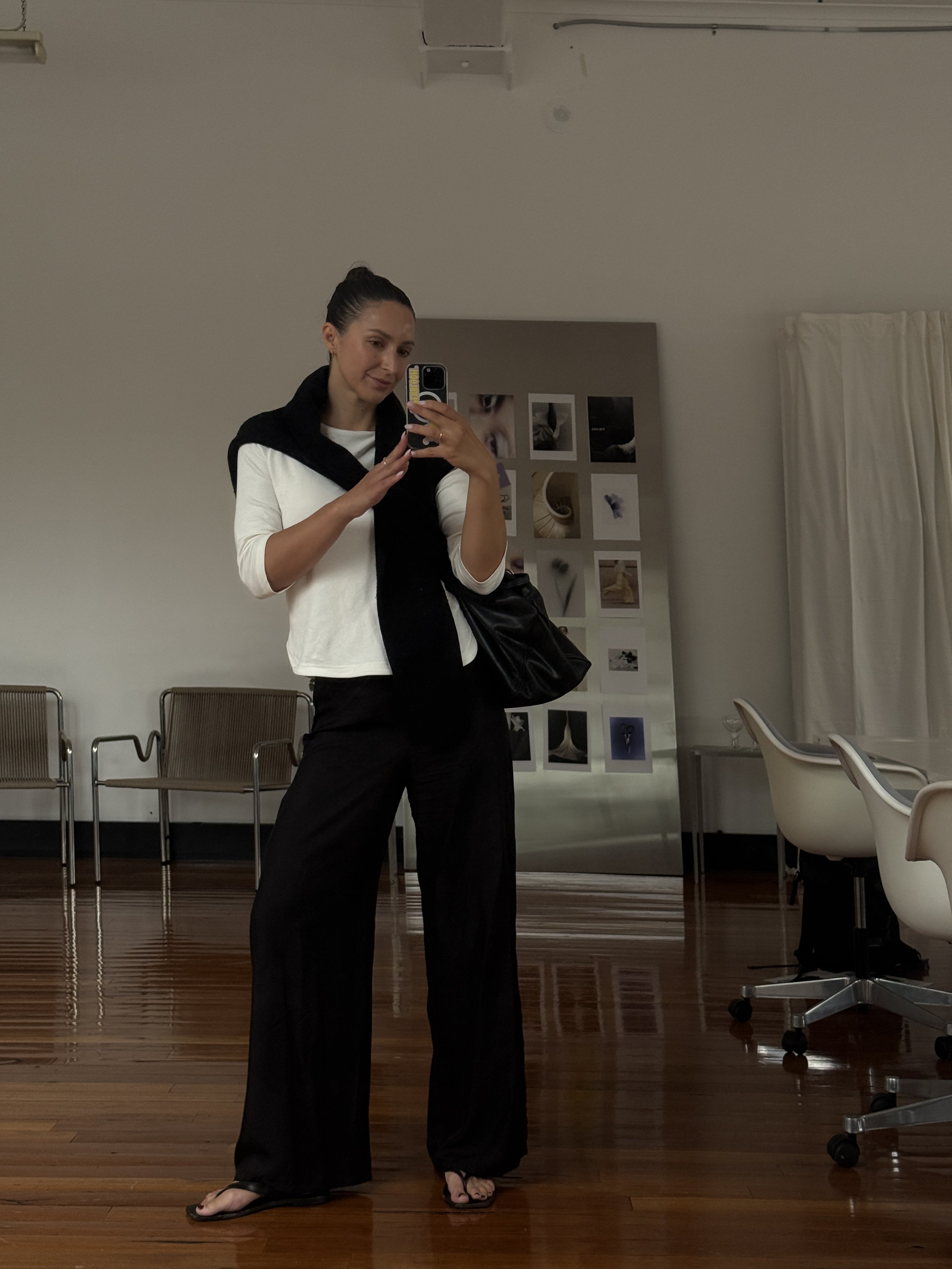 Phoebe Woods standing in her workplace in Melbourne