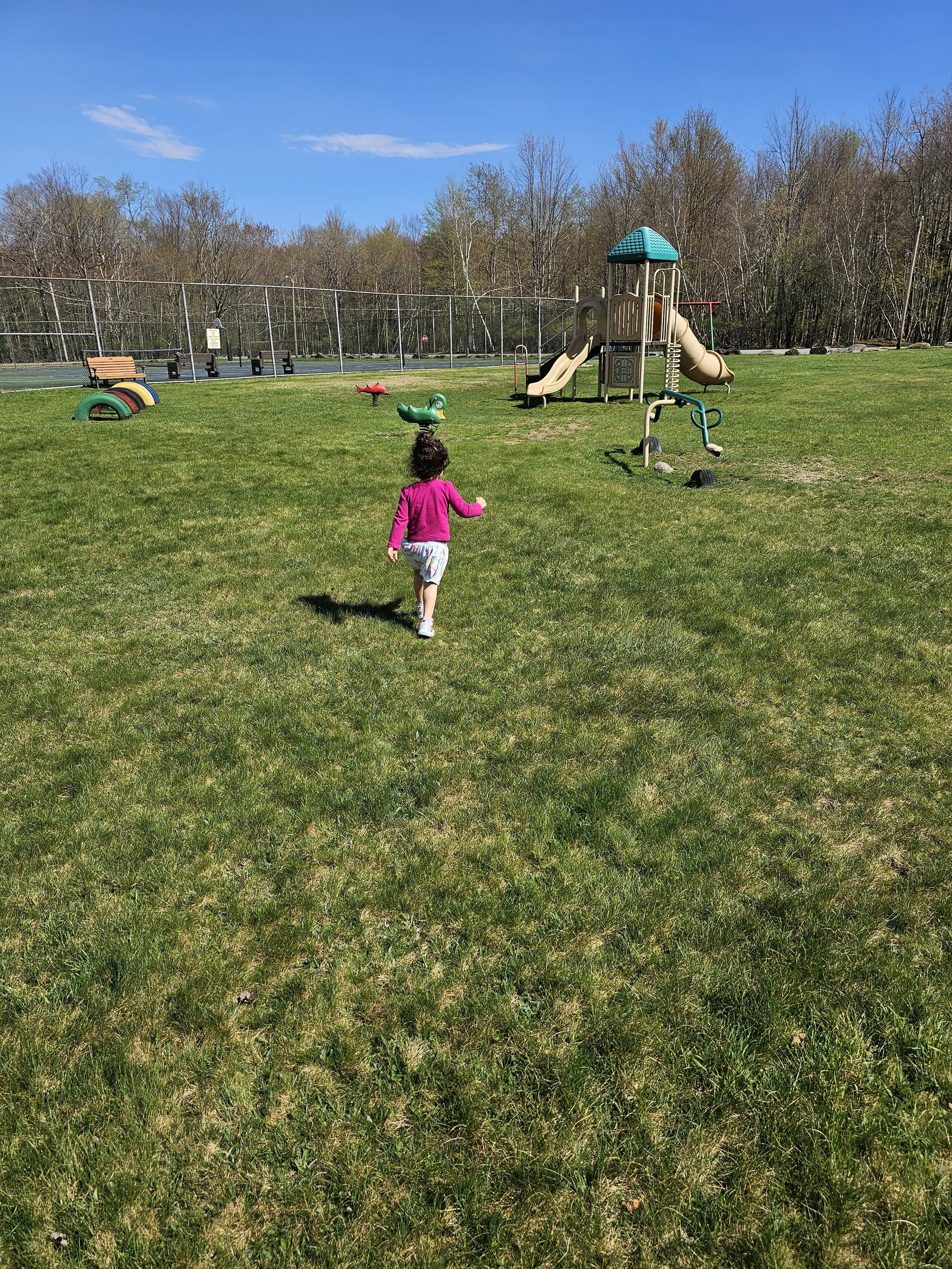 Cute little playground with lots of room to run and tennis/pickleball court.