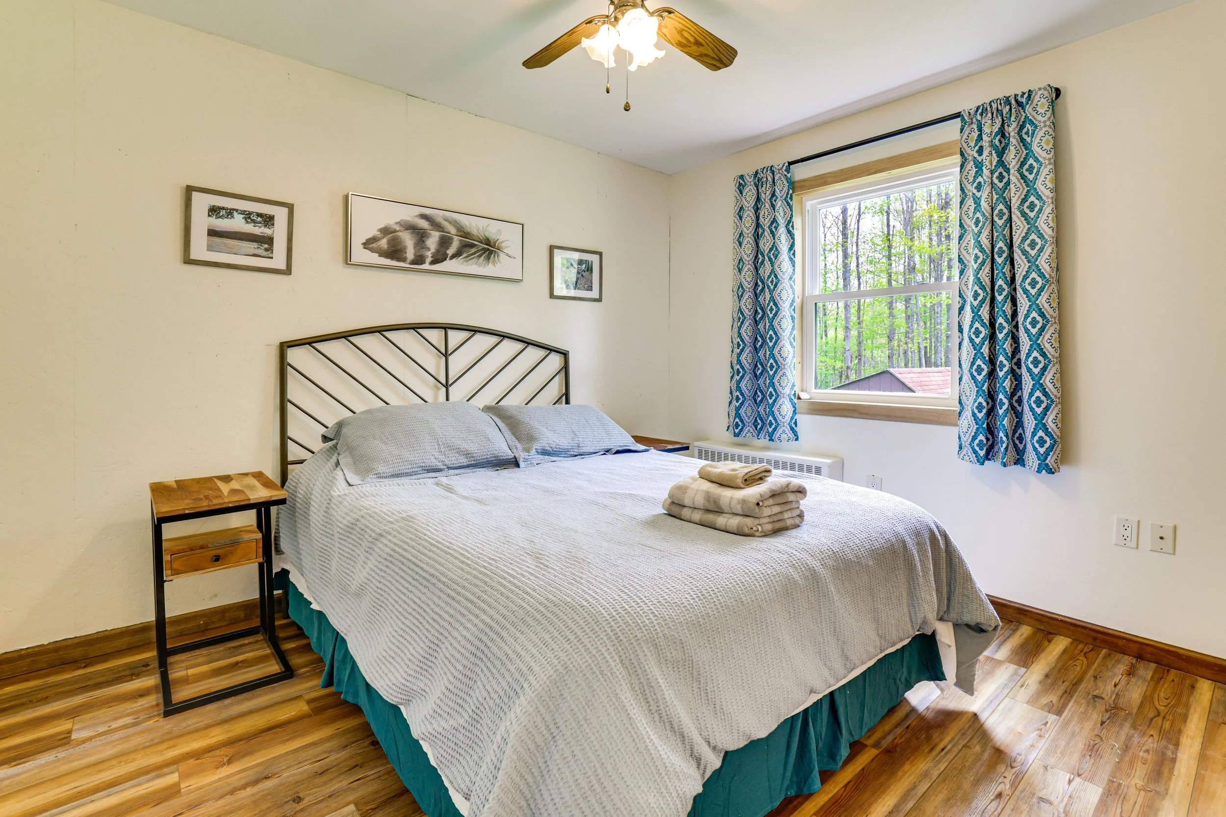 Main Queen Bedroom, with spare travel pack n play in closet.