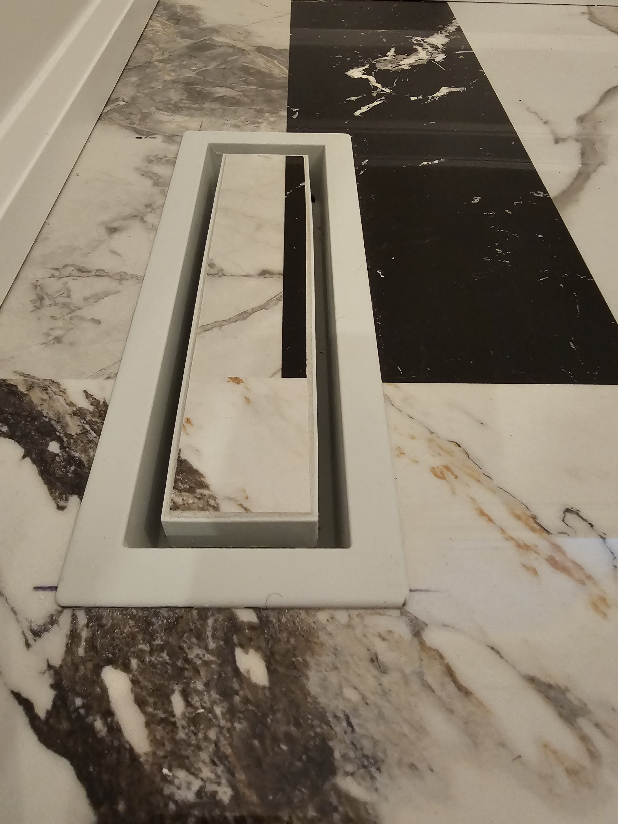 Upgrade your flooring with a custom tile floor vent / heat register that blends seamlessly into your tile layout. This technique allows your floor tiles to flow uninterrupted, creating a clean, modern look while keeping your heating system fully func