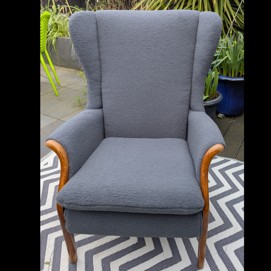 Parker Knoll 750 Wingback chair upholstered in bouclé fabric