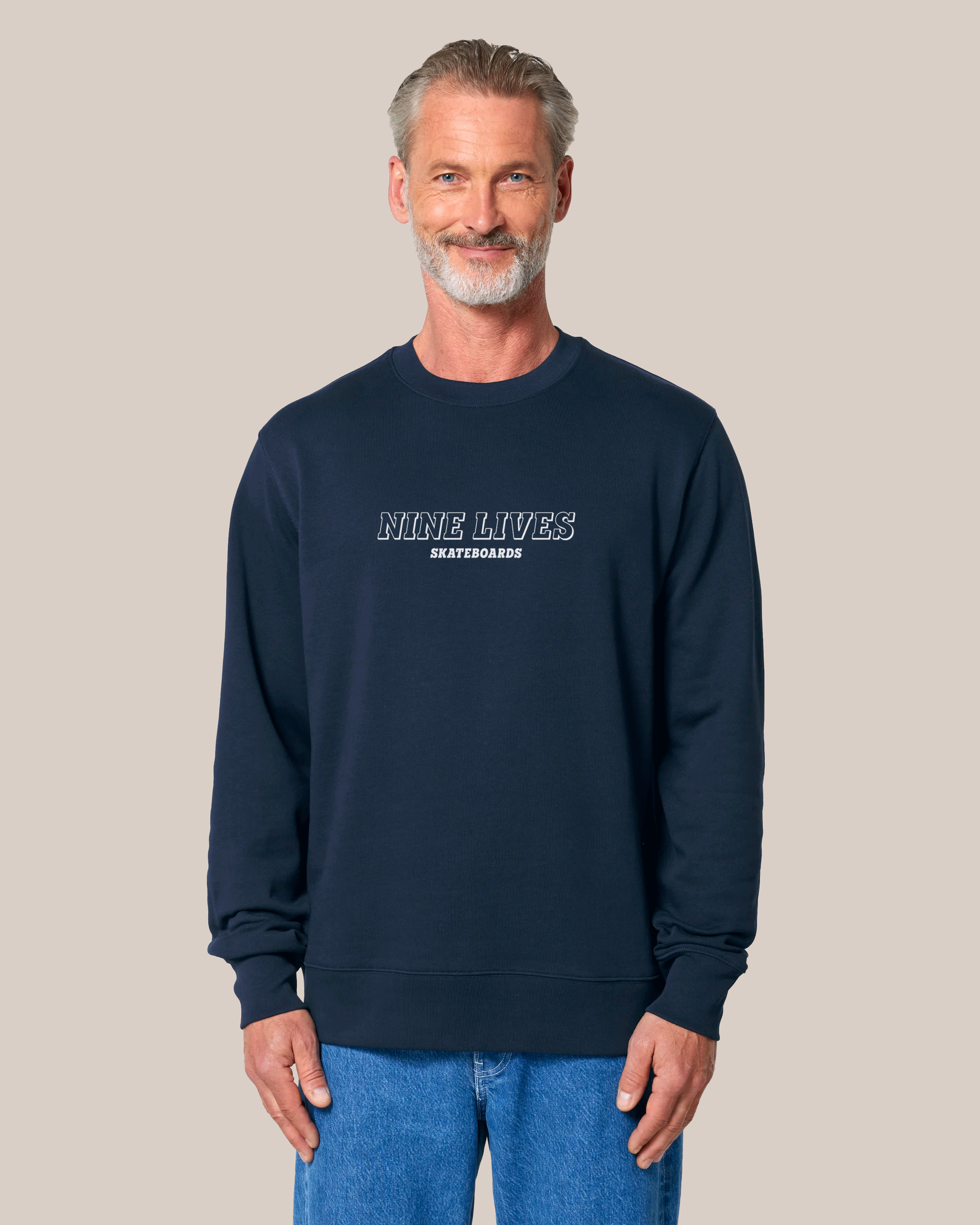 nine-lives-skateboards-slab-collection-french-navy-sweatshirt-front-with-a-slab-collection-nine-lives-skateboards-logo-on-the-front.png