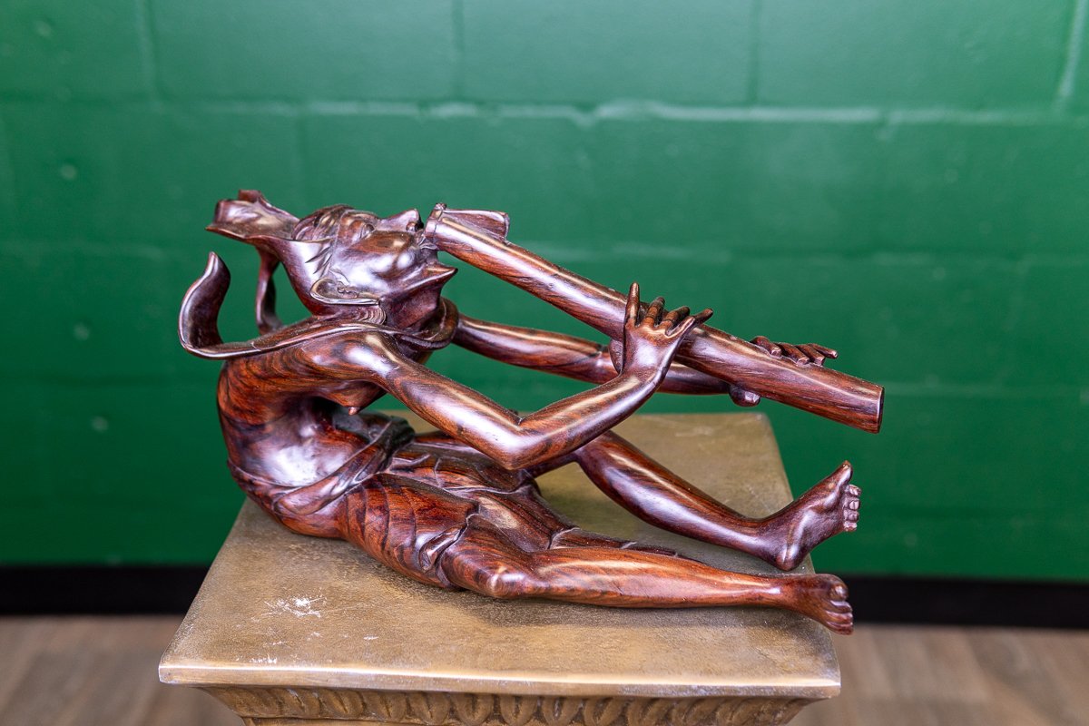 carved-flute-player-1.jpg