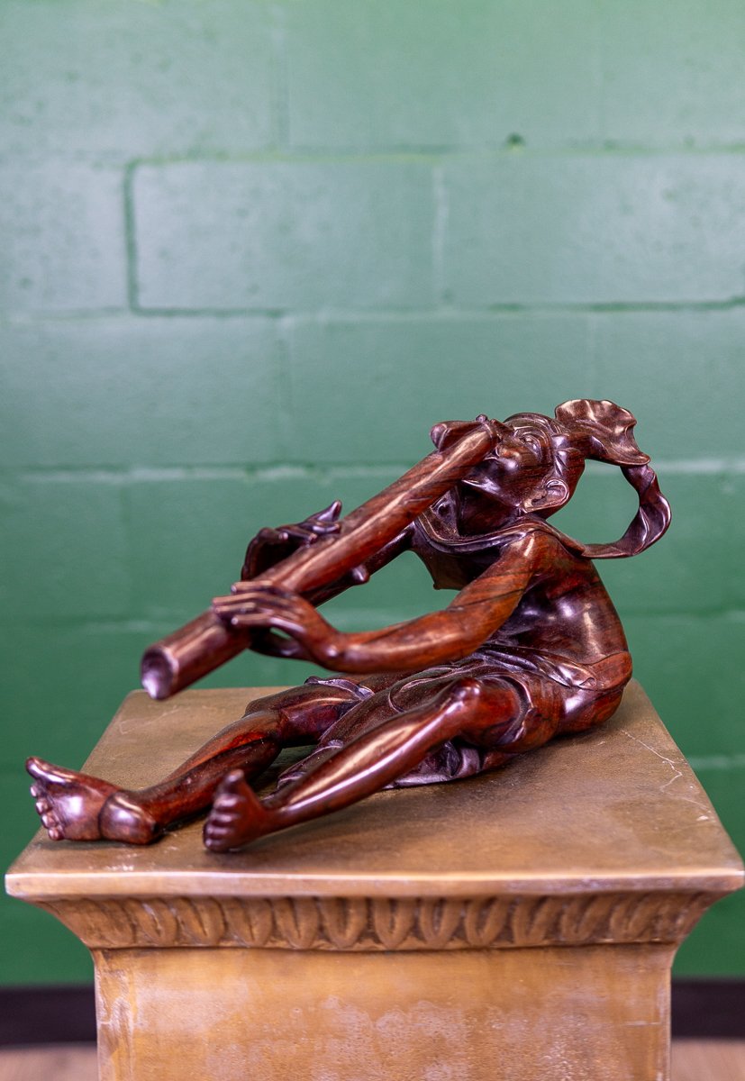 carved-flute-player-2.jpg