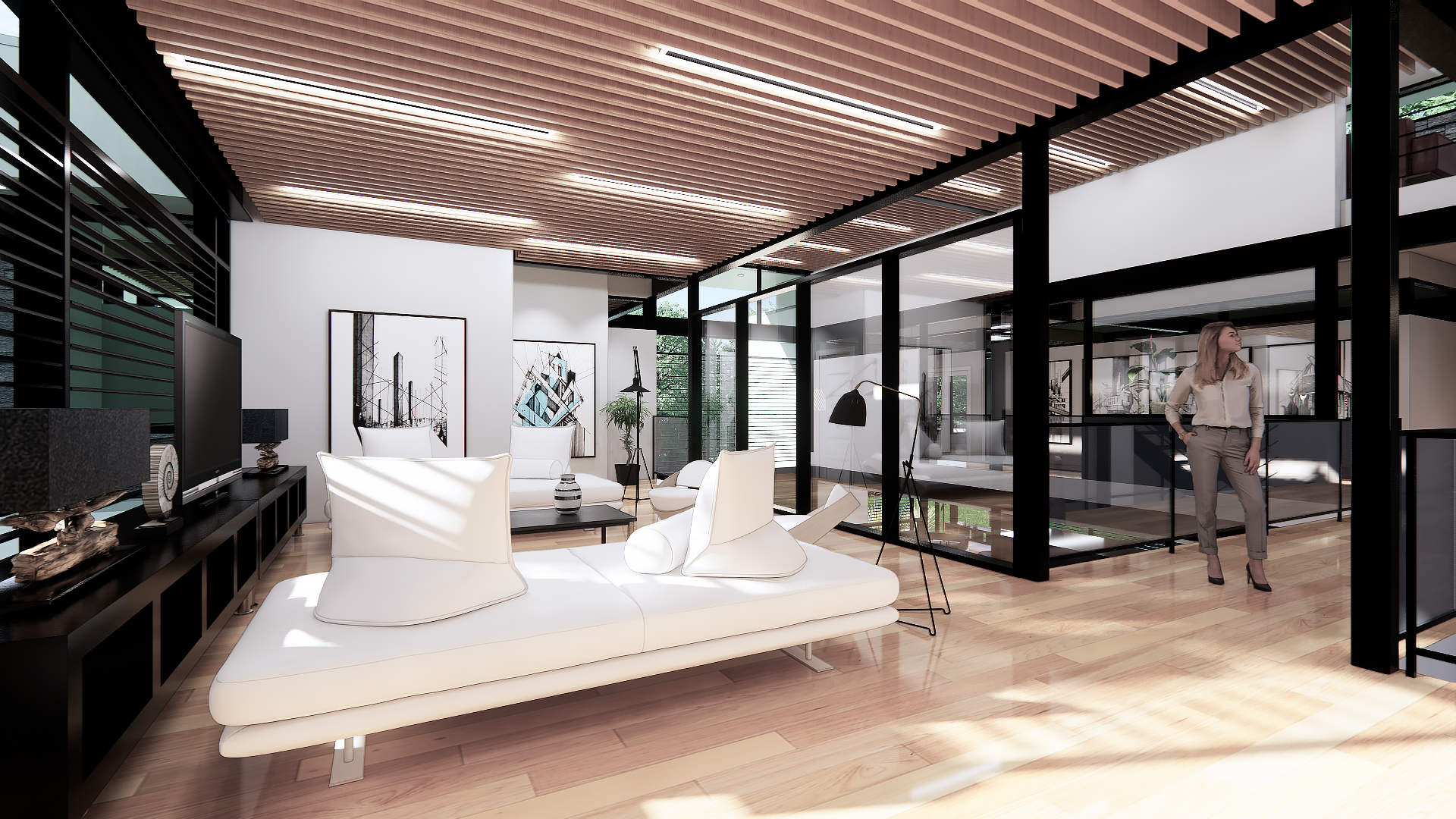 Modern living room with white sofa, black coffee table, wall art, black shelving, and a woman standing in the background near glass walls and a staircase.