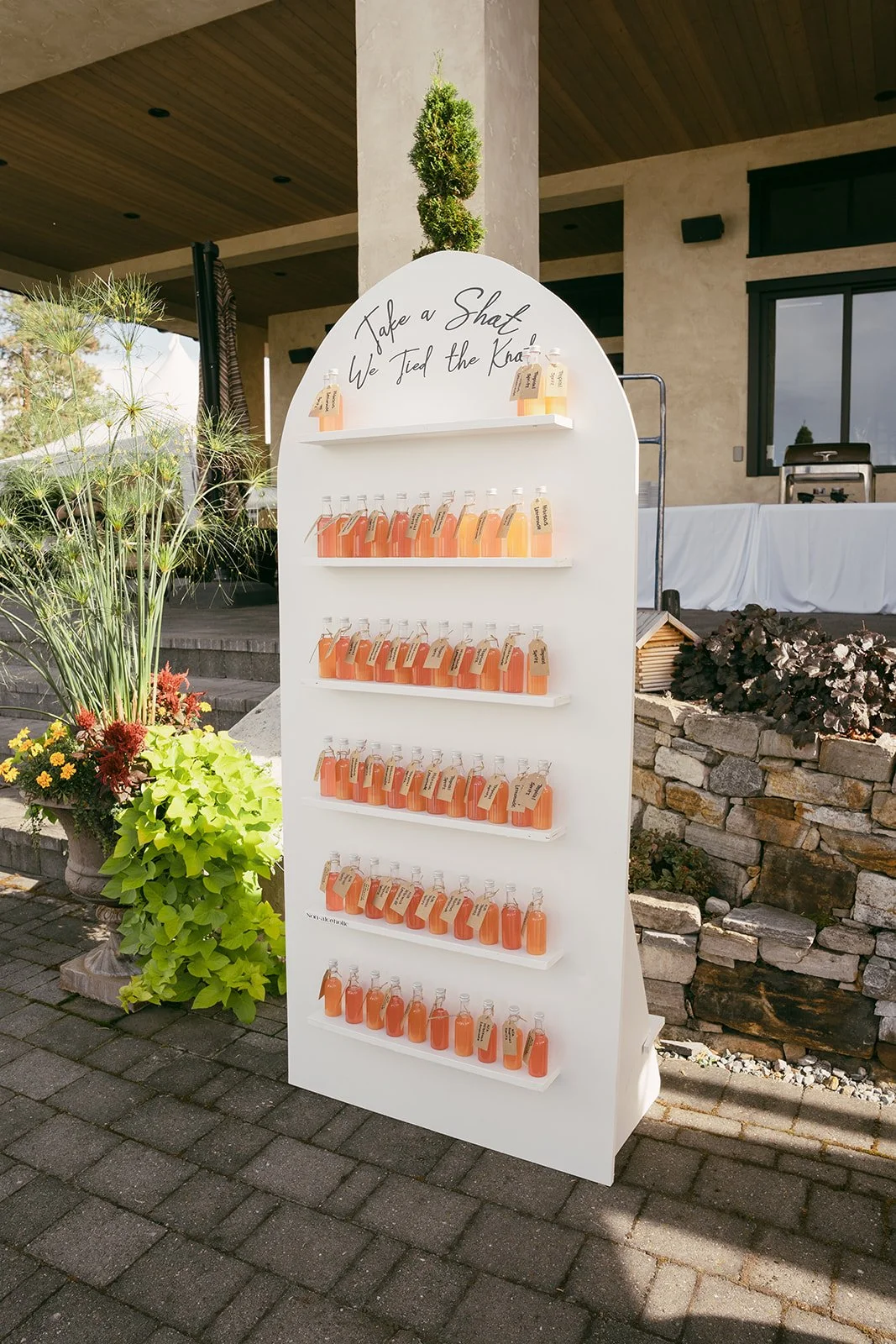 Playful shot wall decorated for the wedding reception
