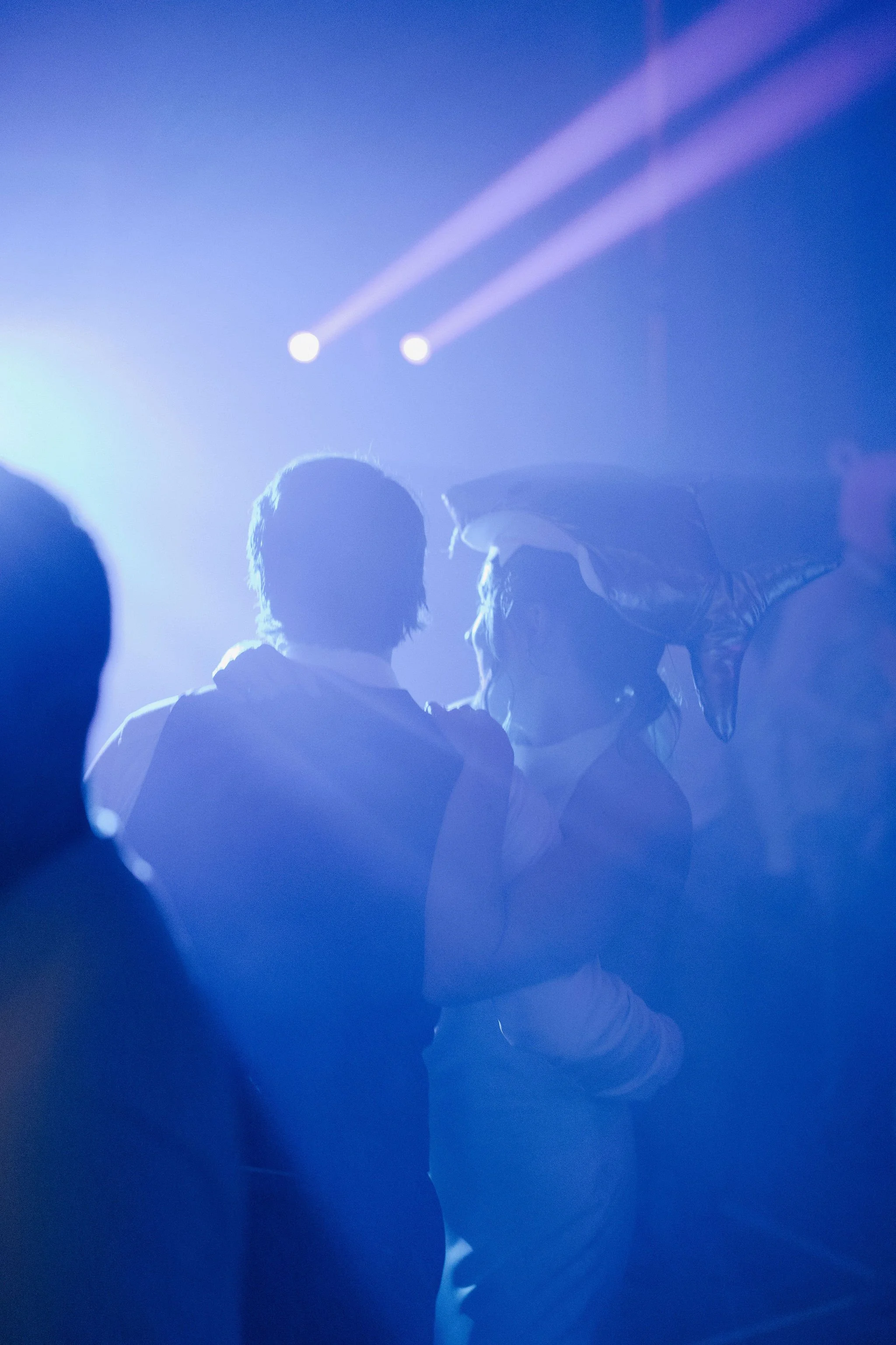 Wedding guests dancing together during the Lake Country reception