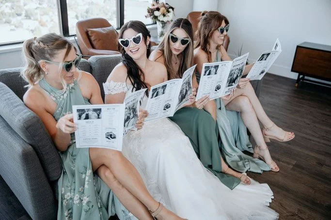 I love seeing personal touches couples bring to their wedding 🥹 

Kelsey &amp; Zach brought:

📰 personalized newspapers
🖍️ custom kids colouring books
🌅 post card guest book
🍪 homemade desserts
🎮 mario kart after party

each touch lets their pe