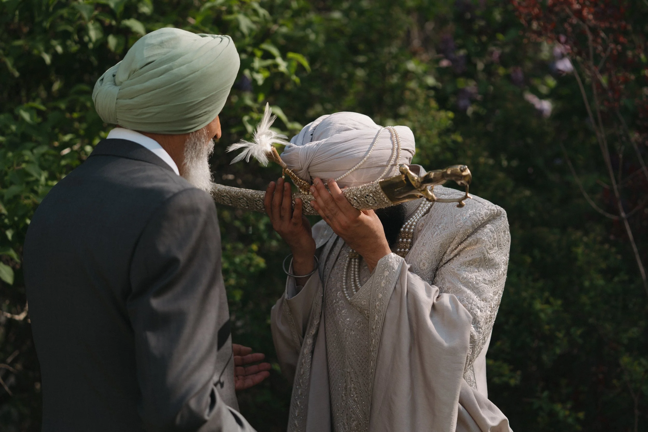 Groom receiving the Talwar