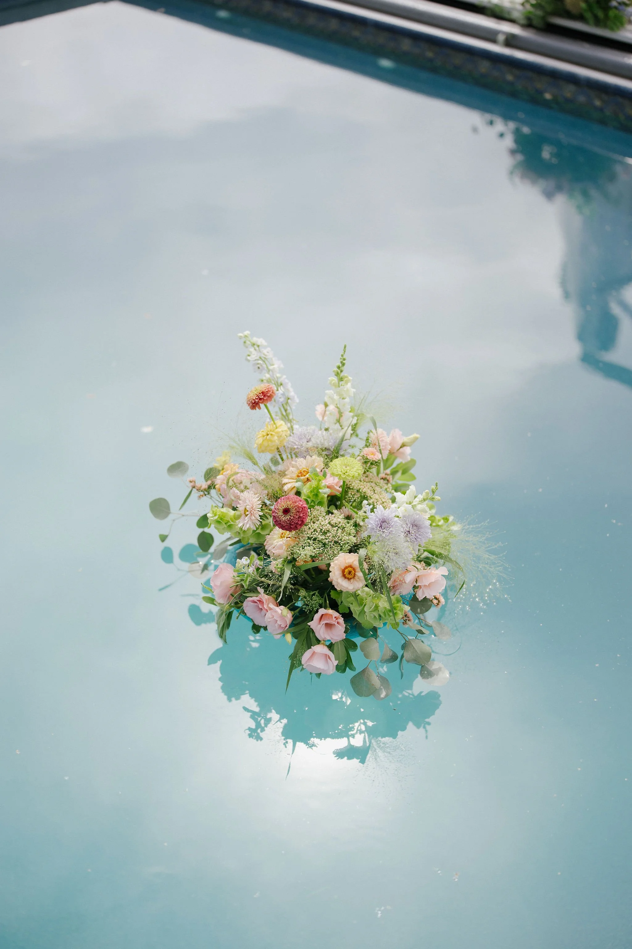 Abundant wedding florals throughout Cat & Cam’s Lake Country wedding