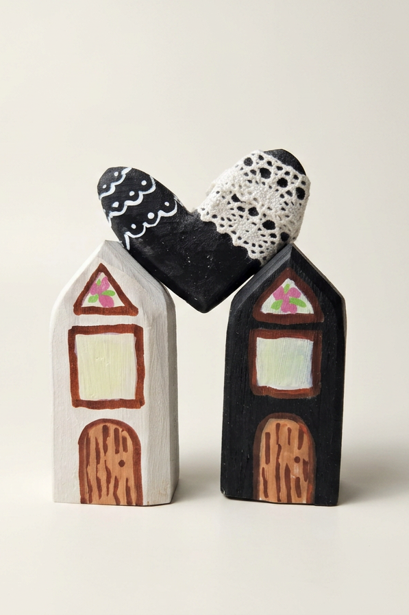 Two houses joined by a heart