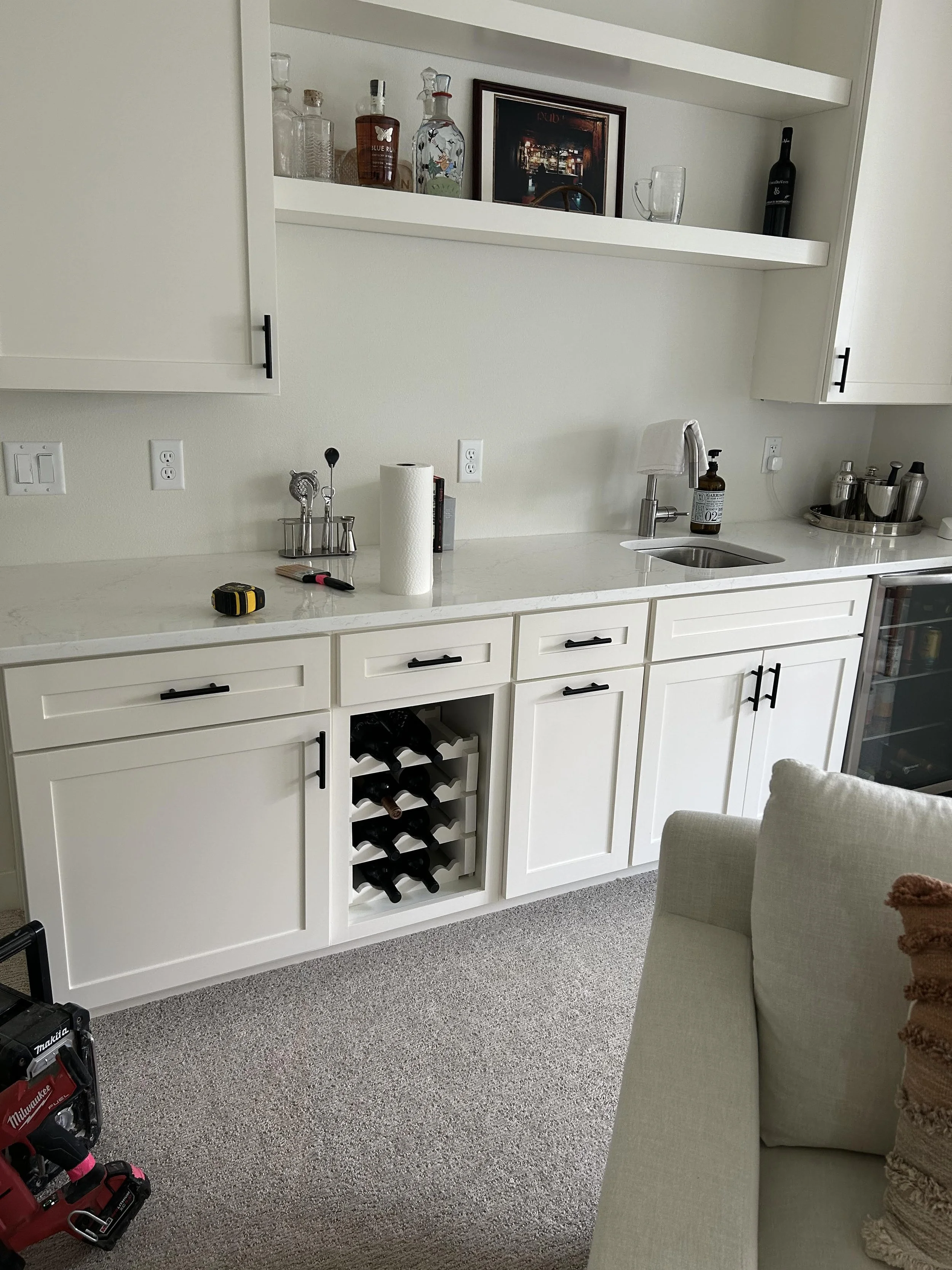 Plenty of display space for high-end bottles or your favorite wine.