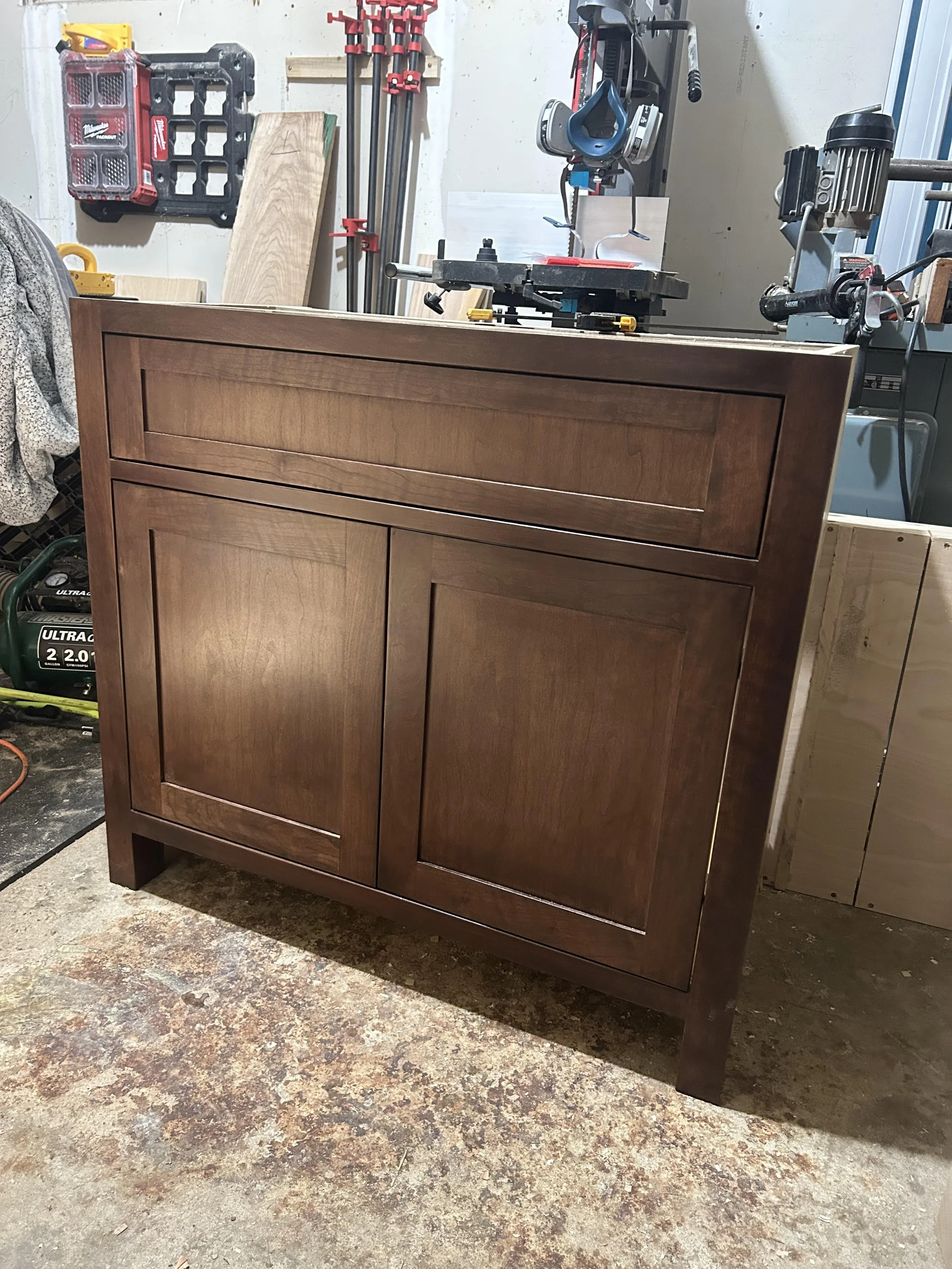 Beautiful dark stained cherry - powder room vanity.