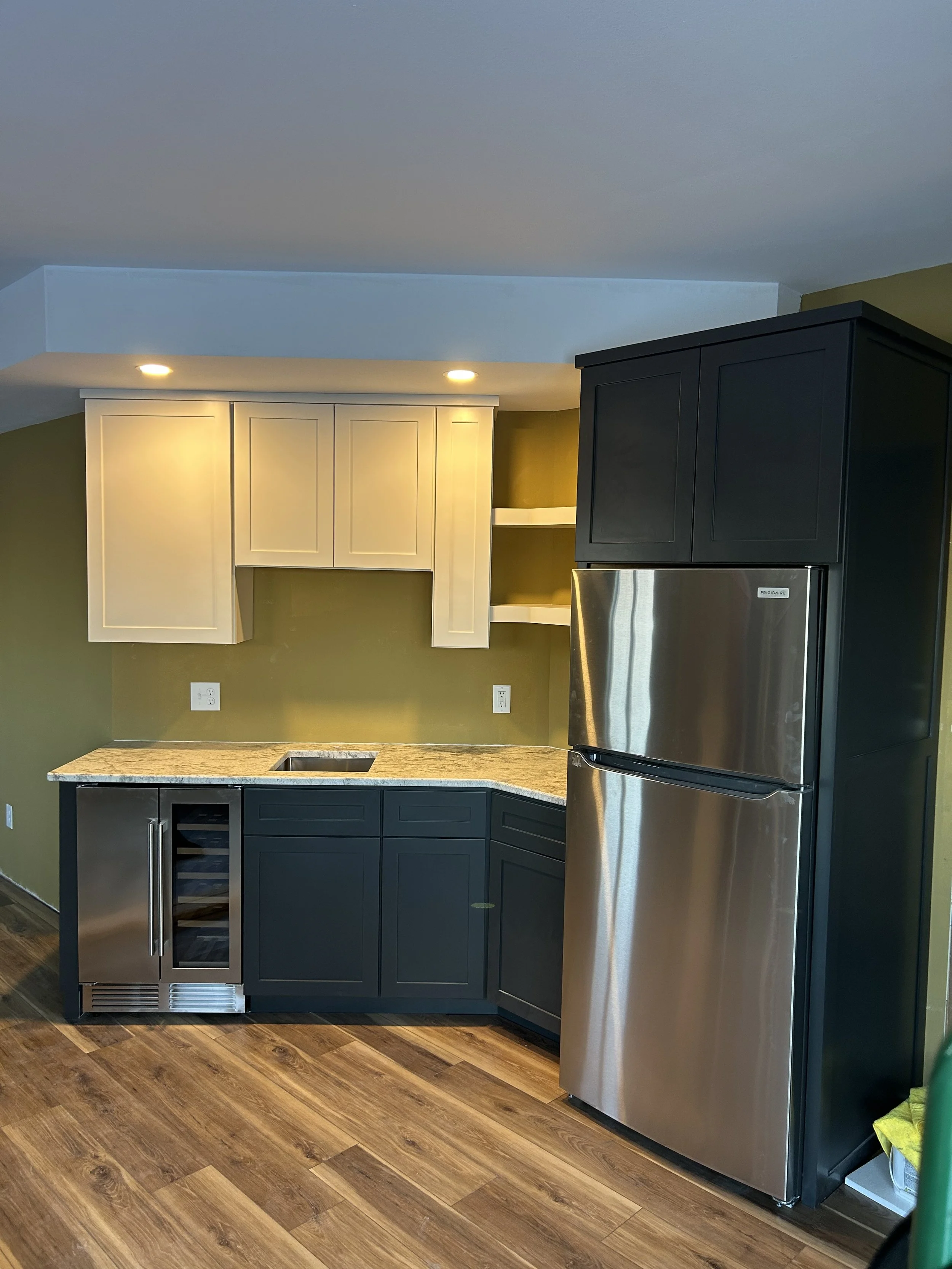 Customer wanted a space for entertainment but also a secondary kitchenette on movie night or sports games.