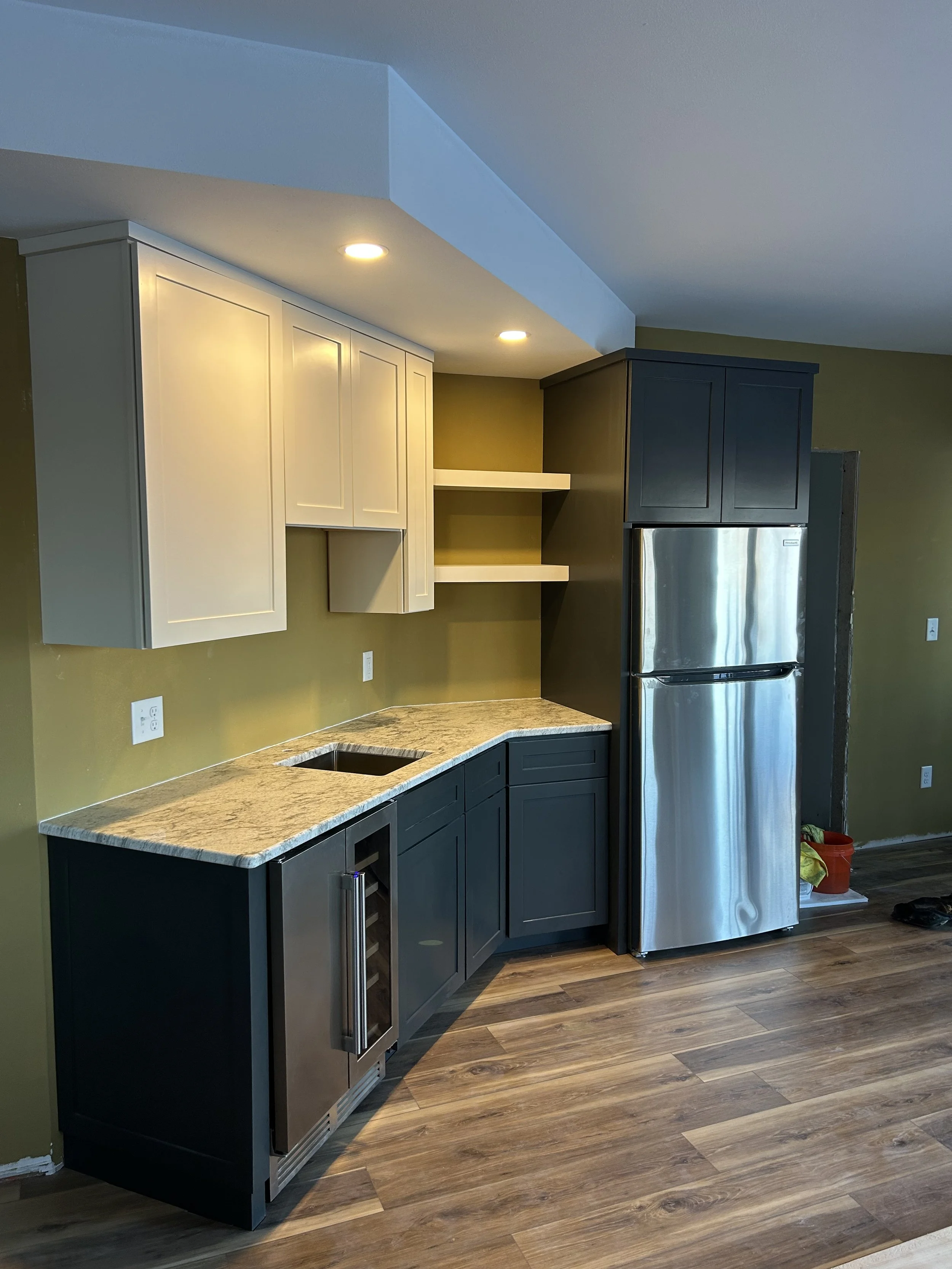 Floating shelves allowed for more storage in a tricky corner space.